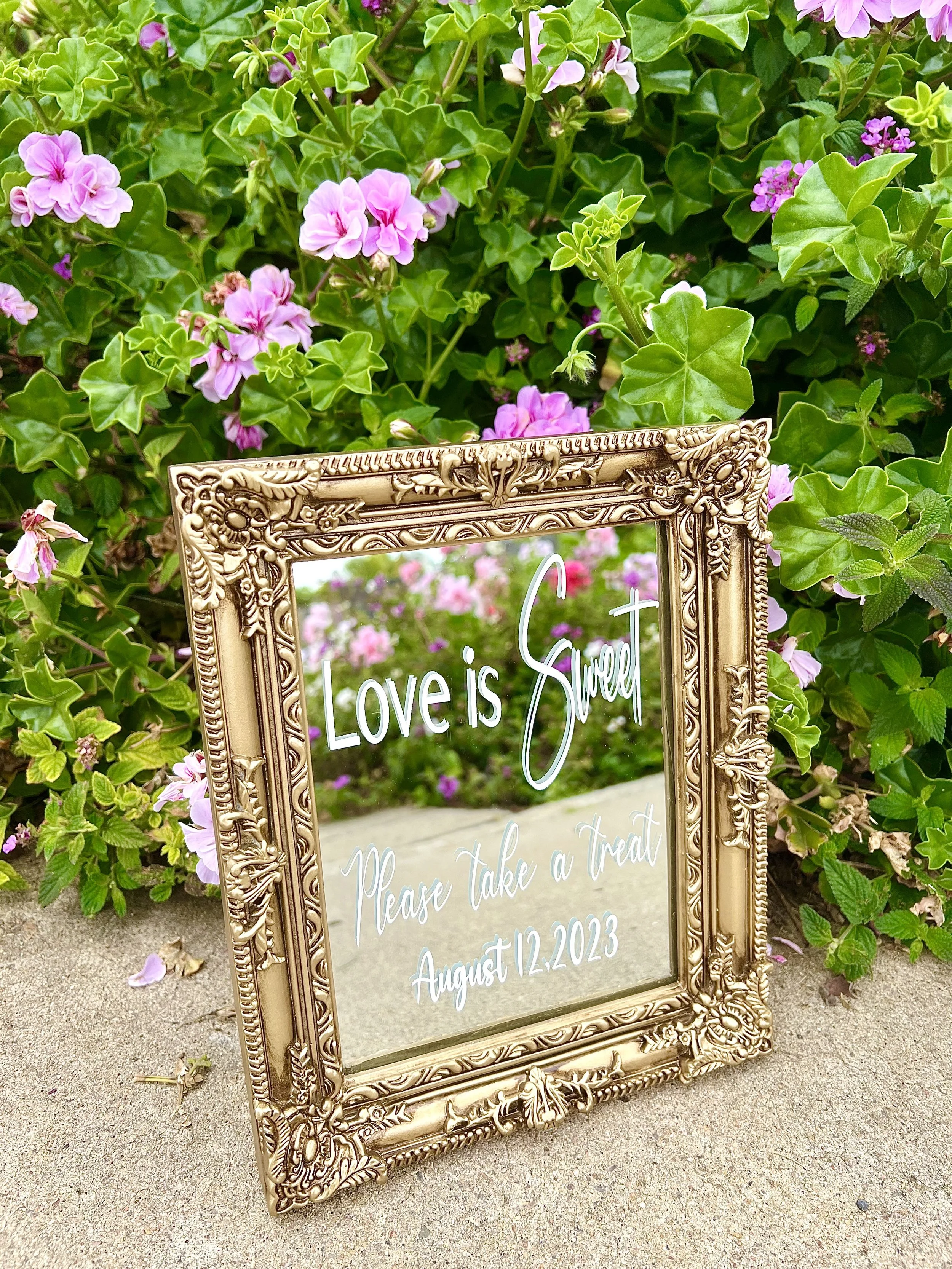 Elevate your wedding reception with our stunning gold mirror signs. Crafted with exquisite detail and vintage charm, this elegant piece adds sophistication to your celebration. Perfect for adding a touch of glamour to your wedding decor, our mirror s