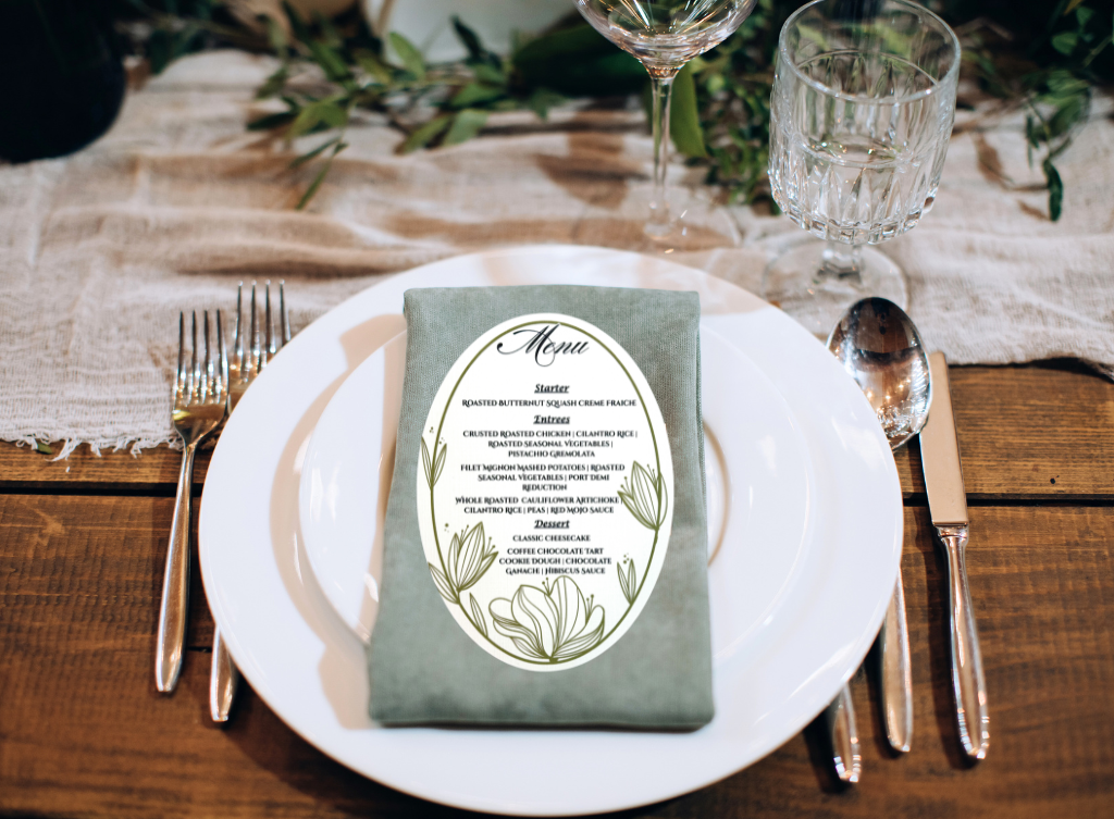 Custom wedding table stationery including place cards, escort cards, and dinner menus