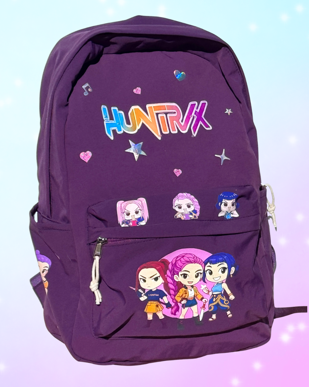 Huntrix K-Pop Demon Hunters purple school backpack with three compartments and padded straps, perfect for students and fans in San Diego.