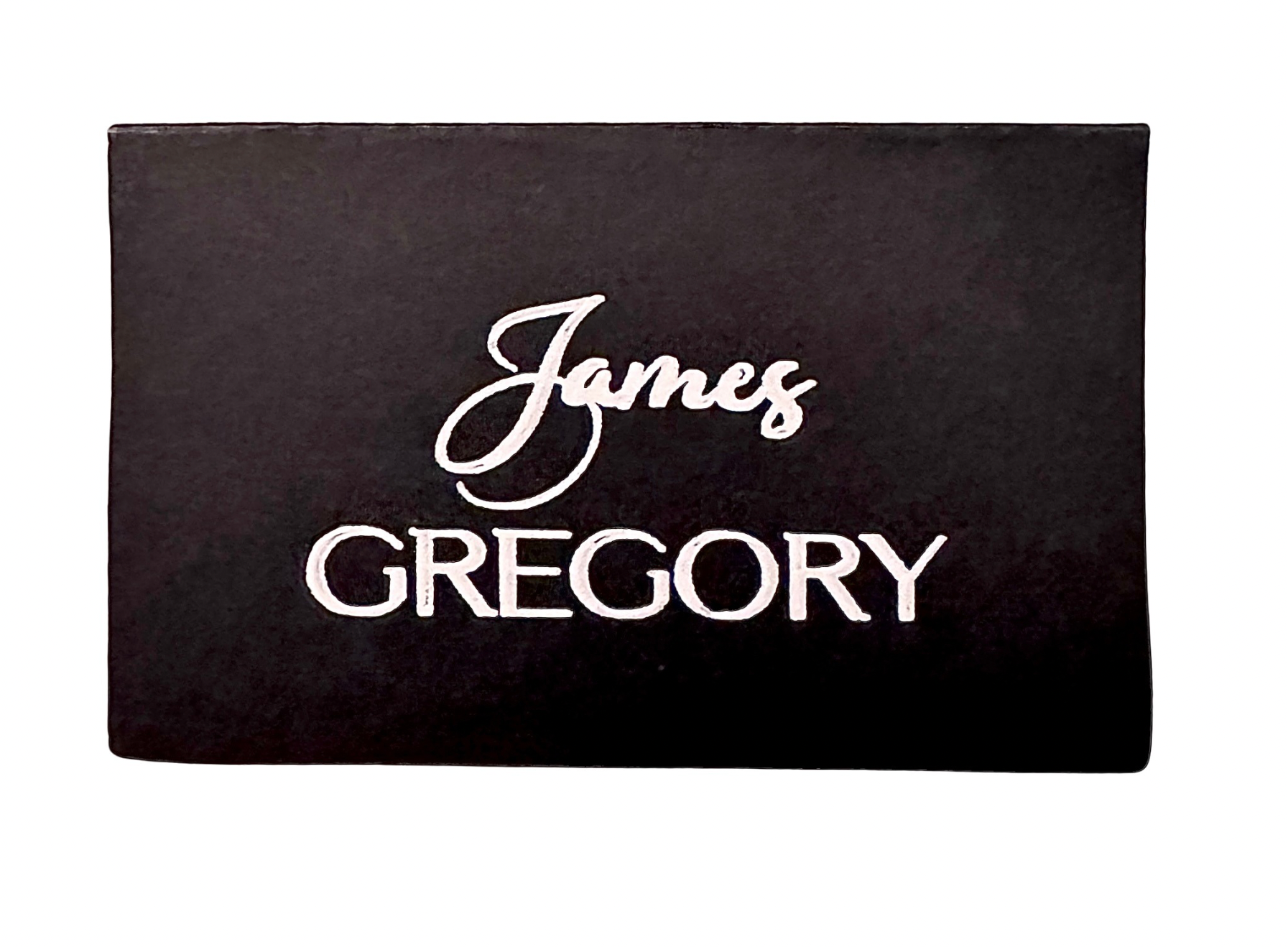 Black handwritten style wedding place cards with white script lettering on black cardstock