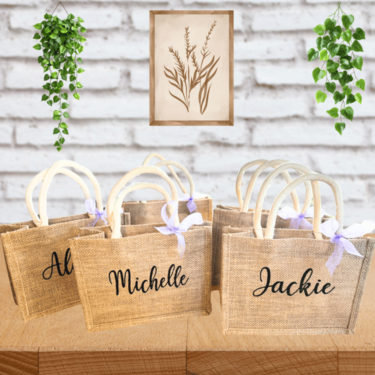 Personalized burlap bachelorette gift bags displayed at a bridal celebration