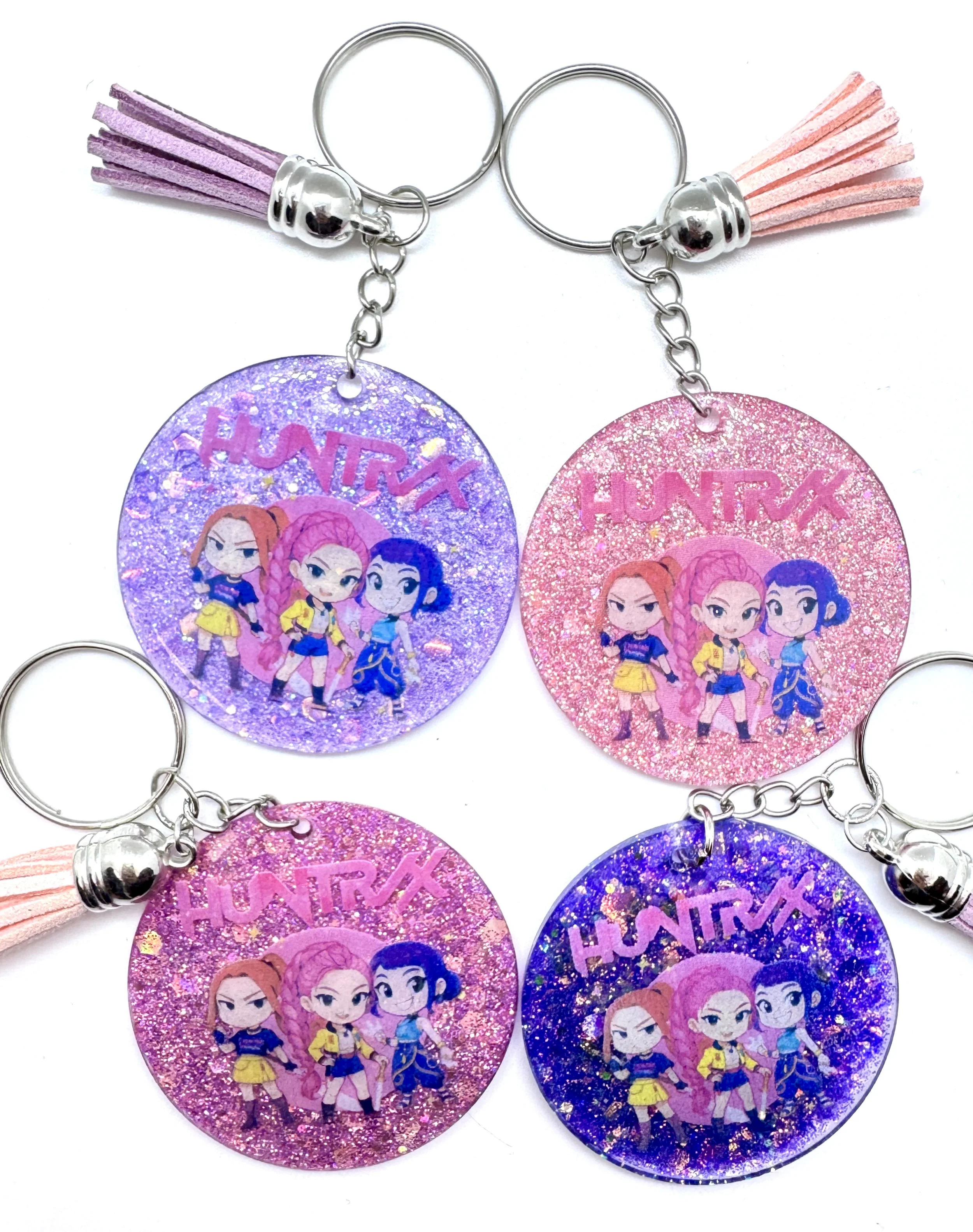 huntrix-kpop-demon-hunters-glitter-keychain.png