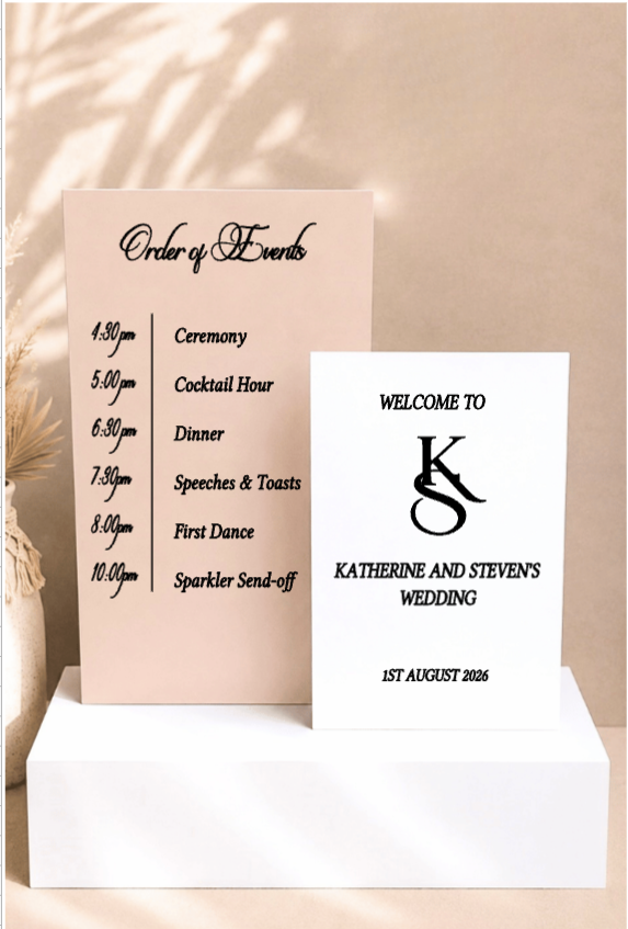 Elegant dual board wedding welcome sign and order of events with personalized wedding décor.