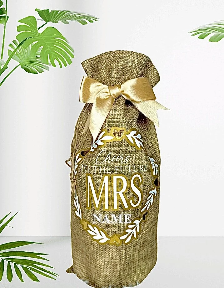 Personalized burlap wine gift bag featuring “Cheers to the Future Mrs” with custom name