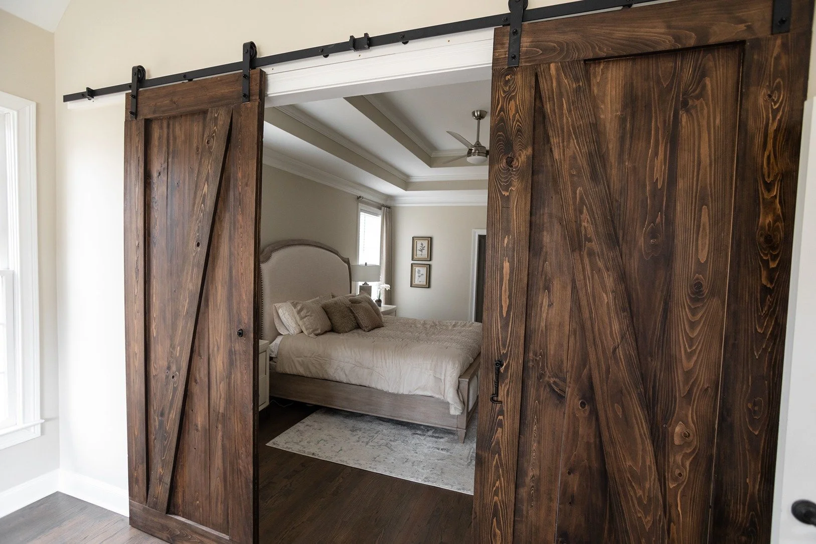 darkwood-barn-doors-master-bedroom-interiors-interior-design-atlanta-georgia.jpg