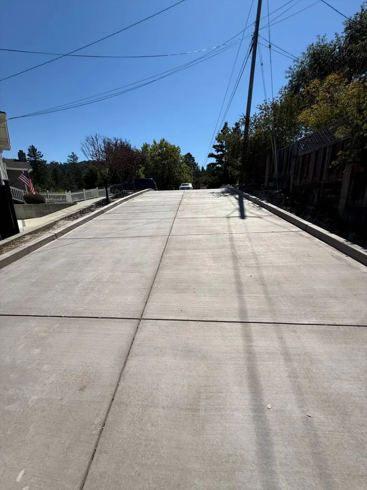 New concrete road and curb installed by Freedom Earthworks in Santa Cruz County