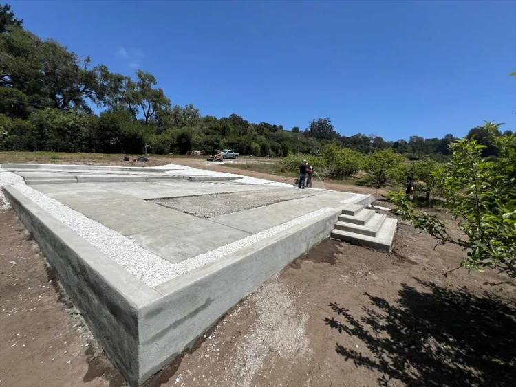 Concrete foundation forms set on a prepared residential site
