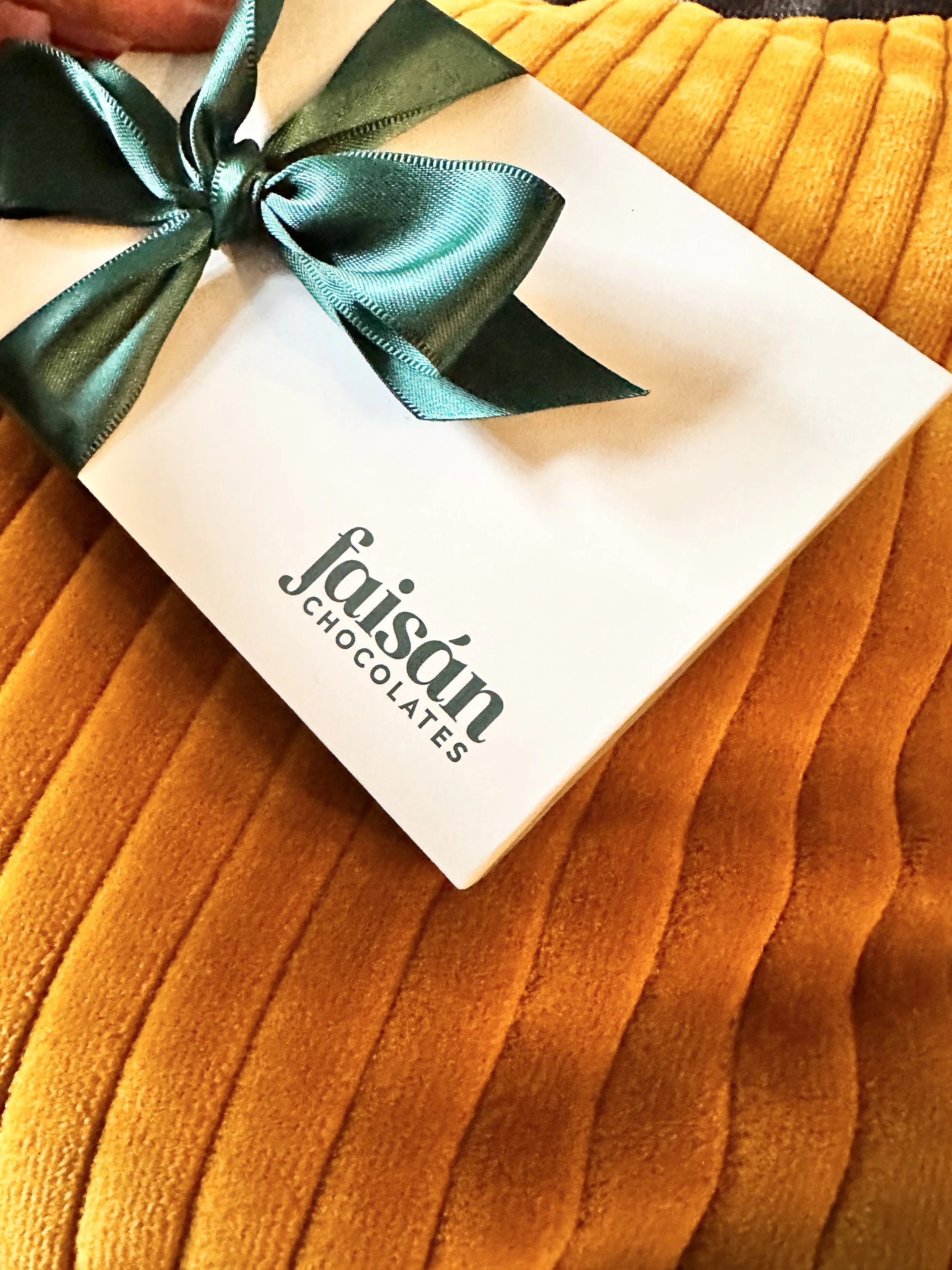 Box in yellow pillow.jpeg