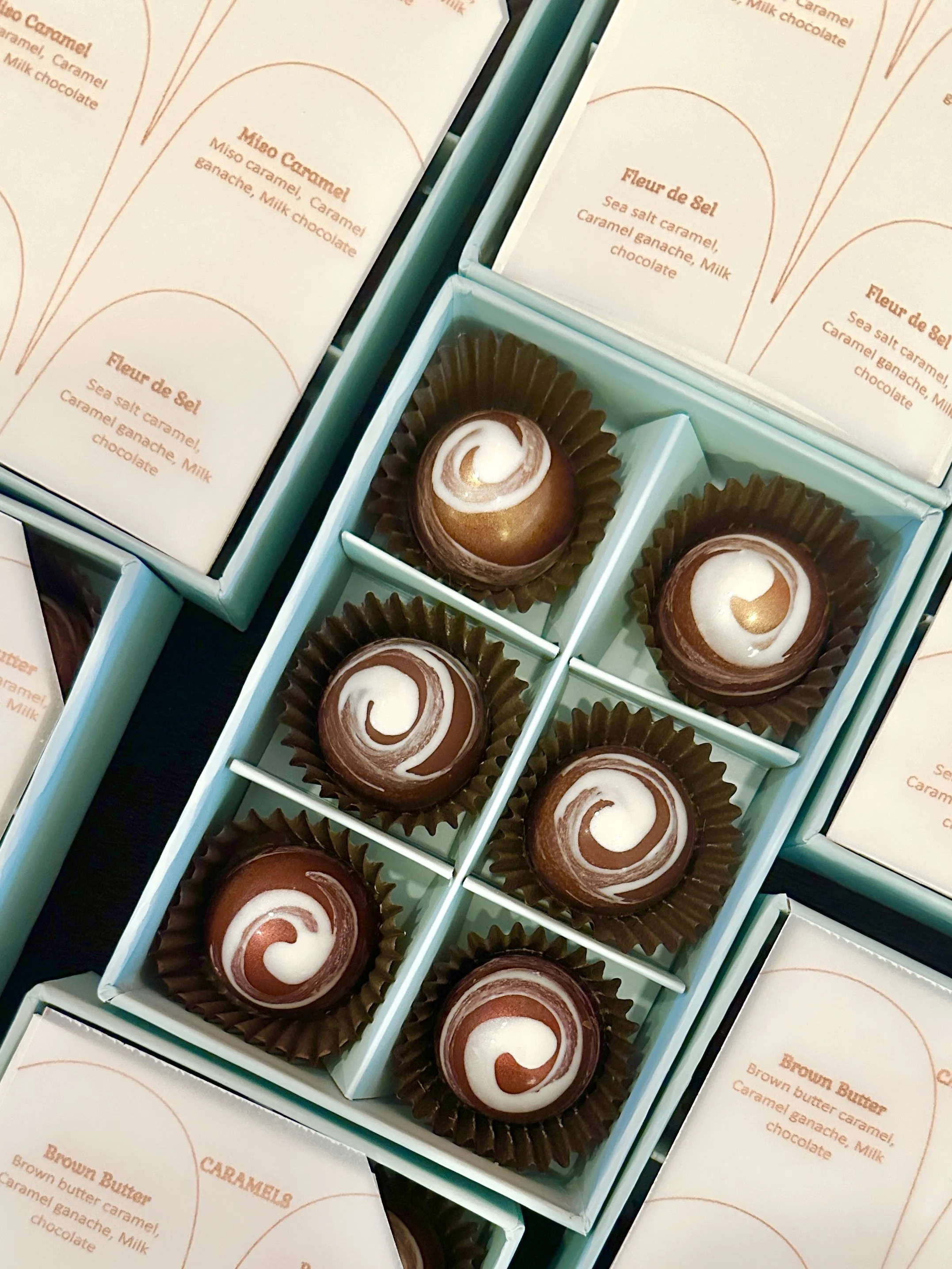 3 caramels in box.jpeg