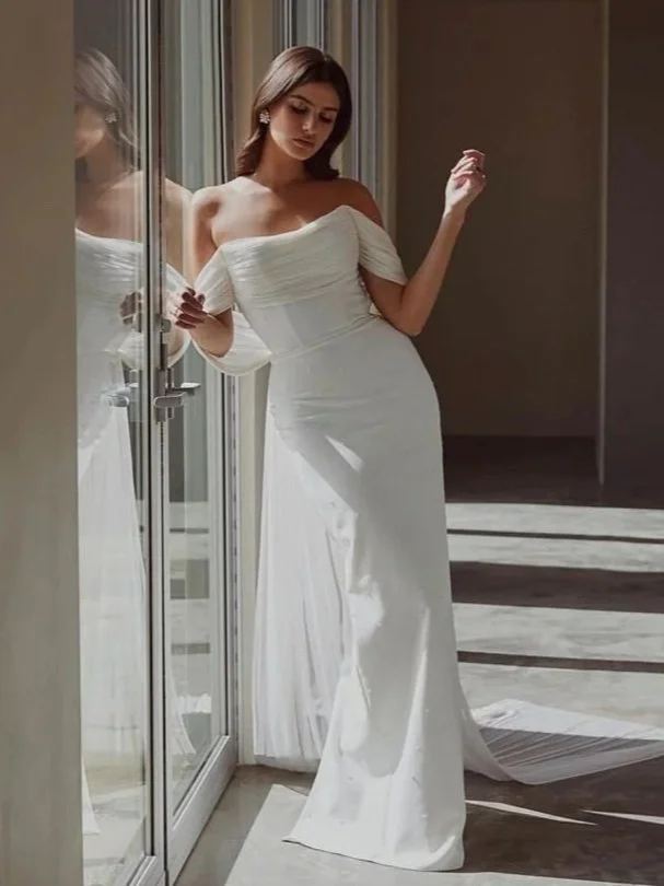 off-the-shoulder wedding dress with pearls and chiffon.
