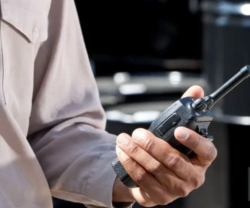 man holding a radio.JPG