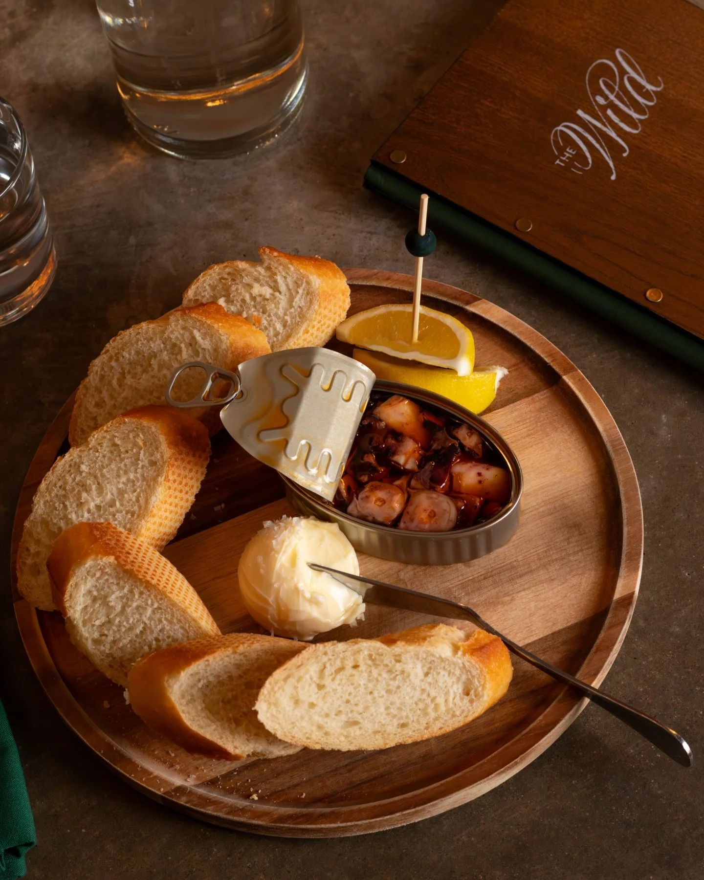 Hot take: the best bar snack comes in a tin. 🦑 

Come check out our selection of premium tinned fish. Calamari, sardines, mussels and more! Come stay a while, at #TheWild 

#denvercolorado #tinnedfish