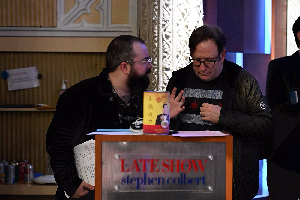 Shane talking with showrunner Tom Purcell side-stage at The Late Show