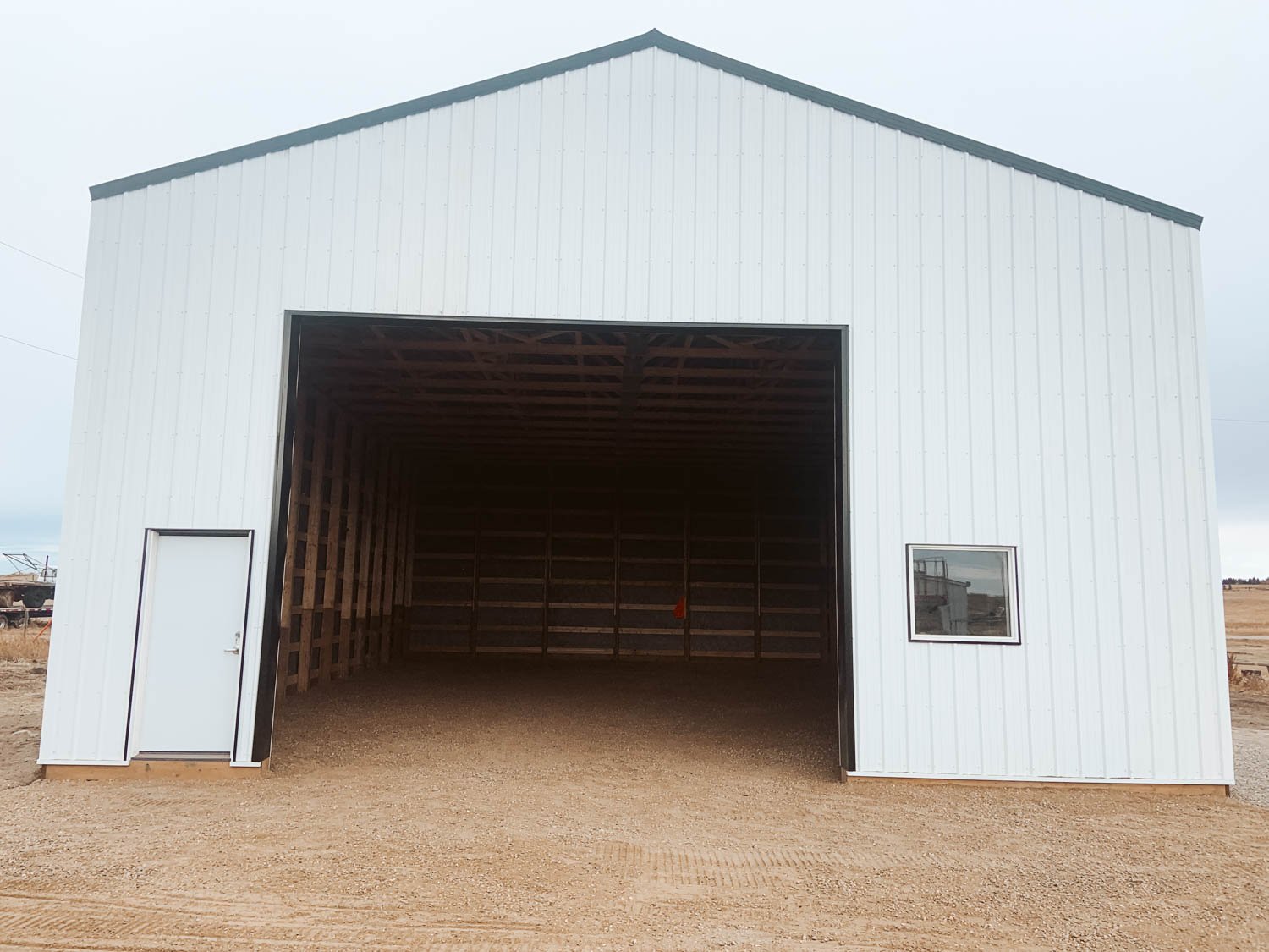 The best in pole structure construction. Strathmore, Langdon, Chestermere, Okotoks, Airdrie, Calgary, Southern Alberta. We aim to be the premier local post frame builder in Wheatland County, Foothills County & Rockyview County. Shops, barns, ridin