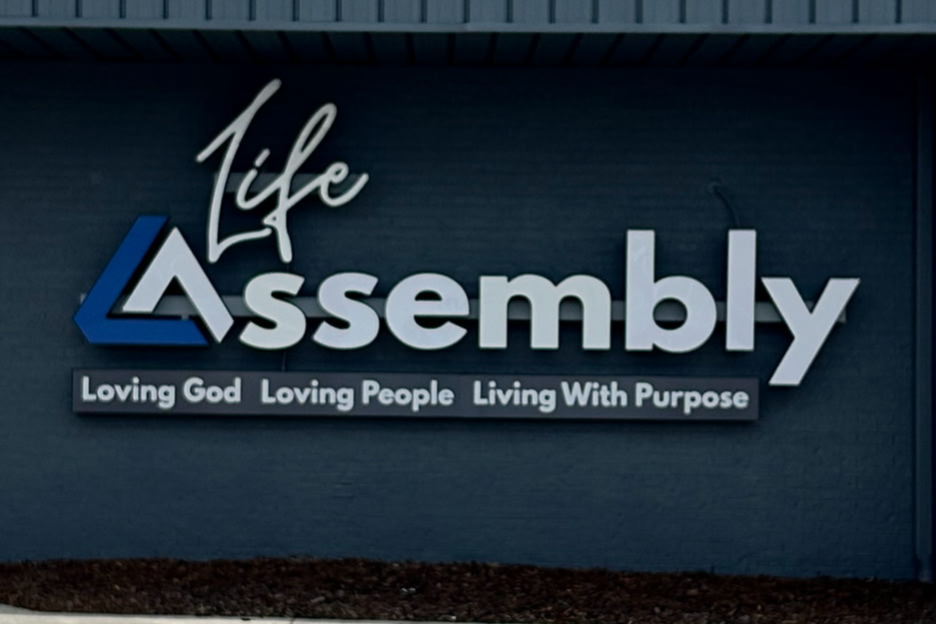 Custom internal illuminated channel letter with custom cabinet for Life Assembly
