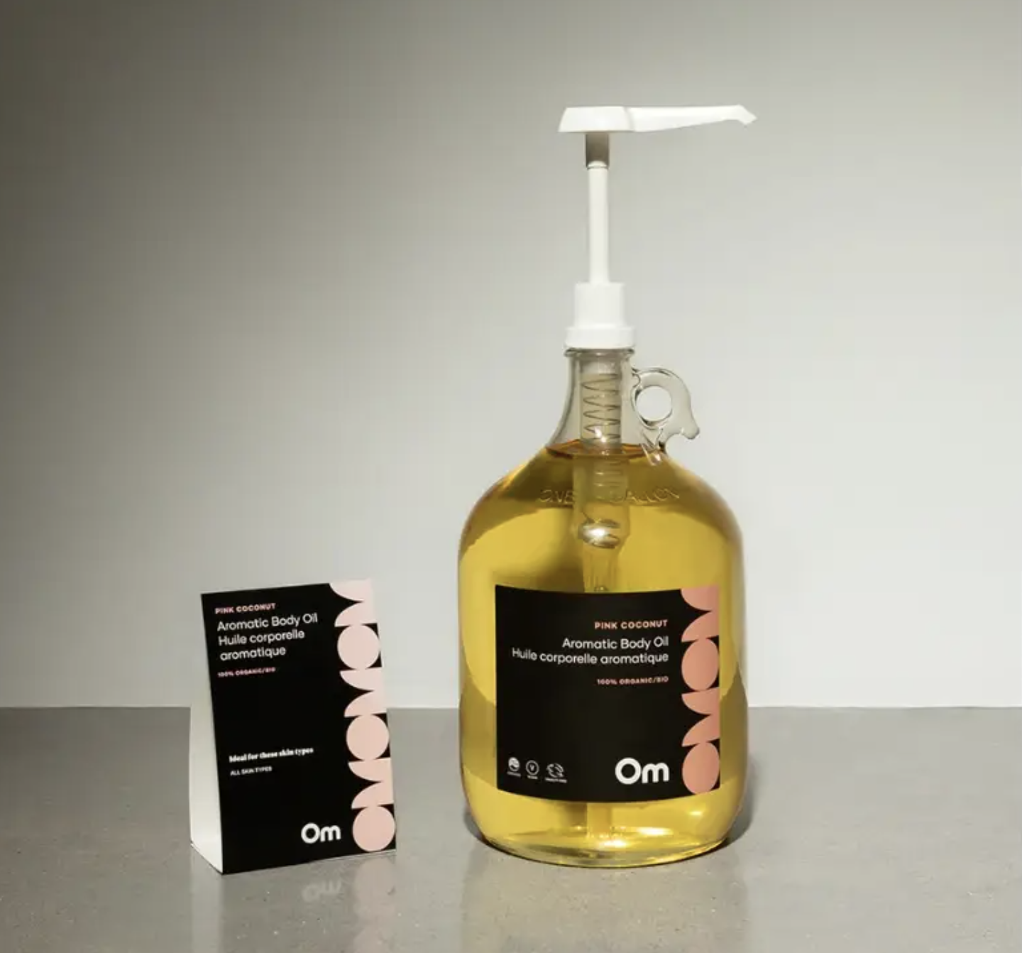 OM pink coconut body oil bulk.png