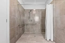 Specialist Disability Accommodation SDA in West Melbourne area Weir Views suburb, with a grab rails and support bars shower, non-slip flooring, thermostatic temperature control that prevent falls and injuries. One current vacancy available