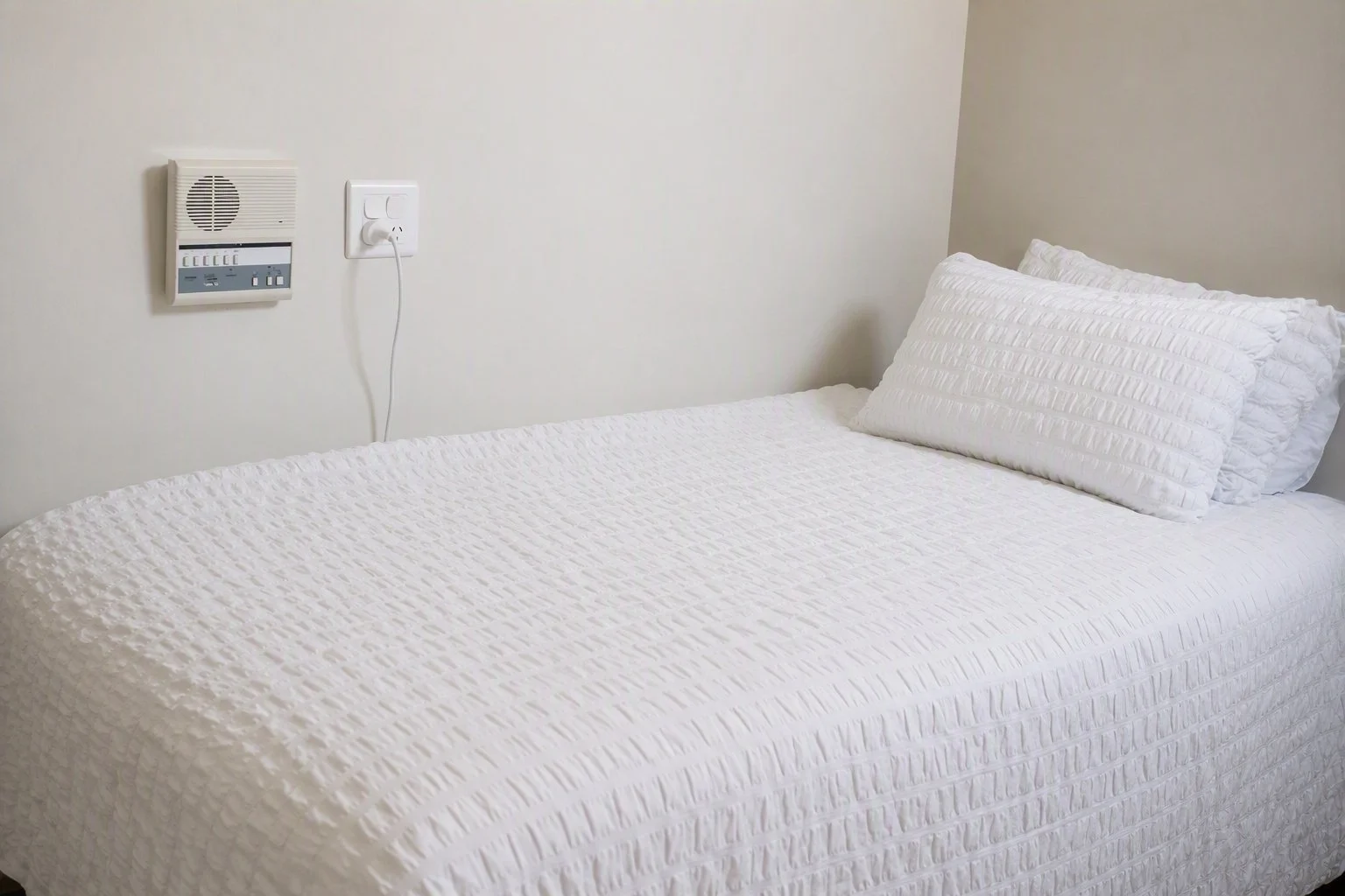Bedroom designated for Disability Support Worker assisting participants overnight at the Specialist Disability Accommodation SDA in West Melbourne area Weir Views suburb for NDIS participants, having emergency call system that is connected to the pub