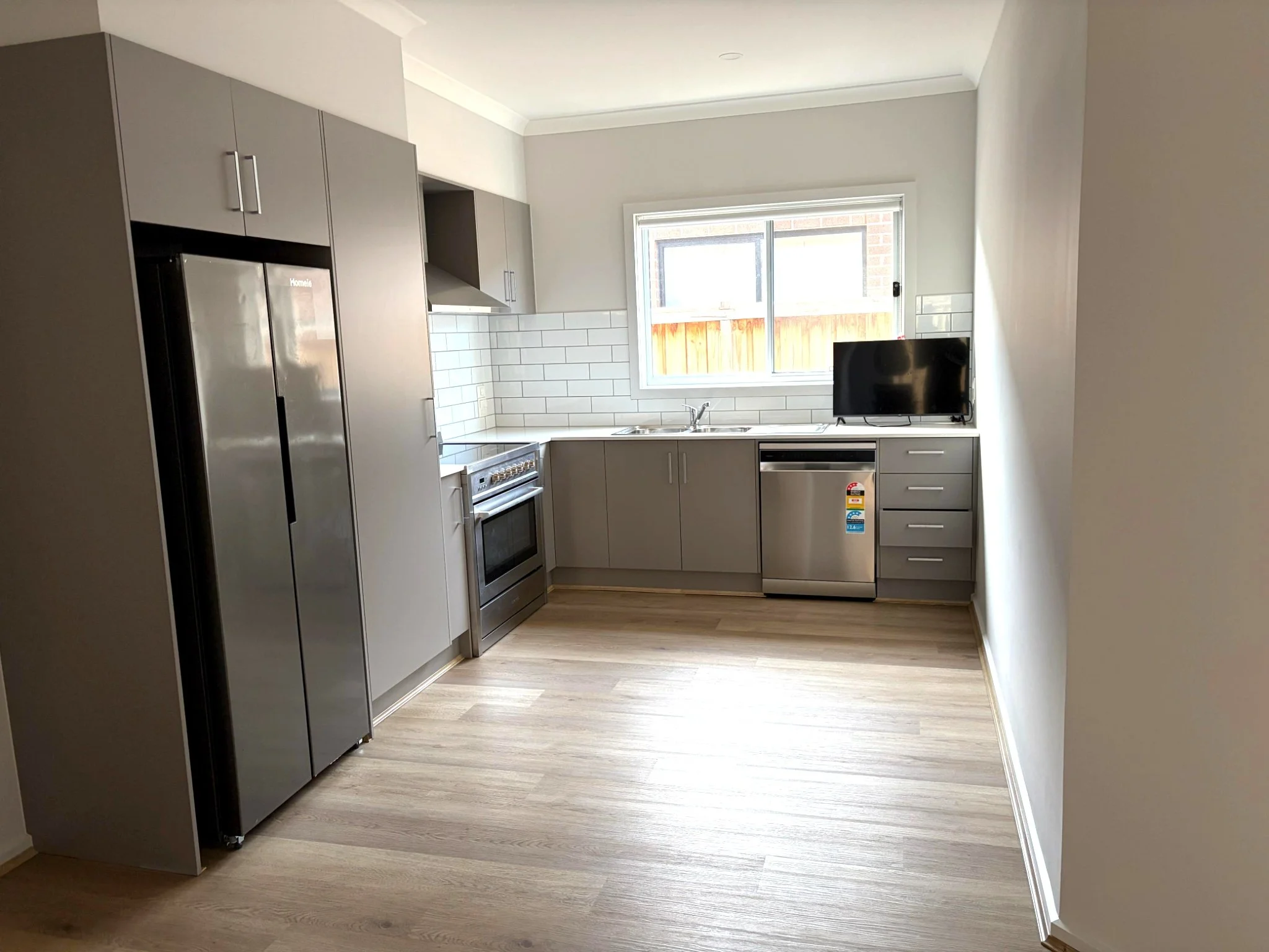 Accessible kitchen at Specialist Disability Accommodation SDA house for NDIS Participants in West Melbourne area Weir Vies suburb. One current vacancy available
