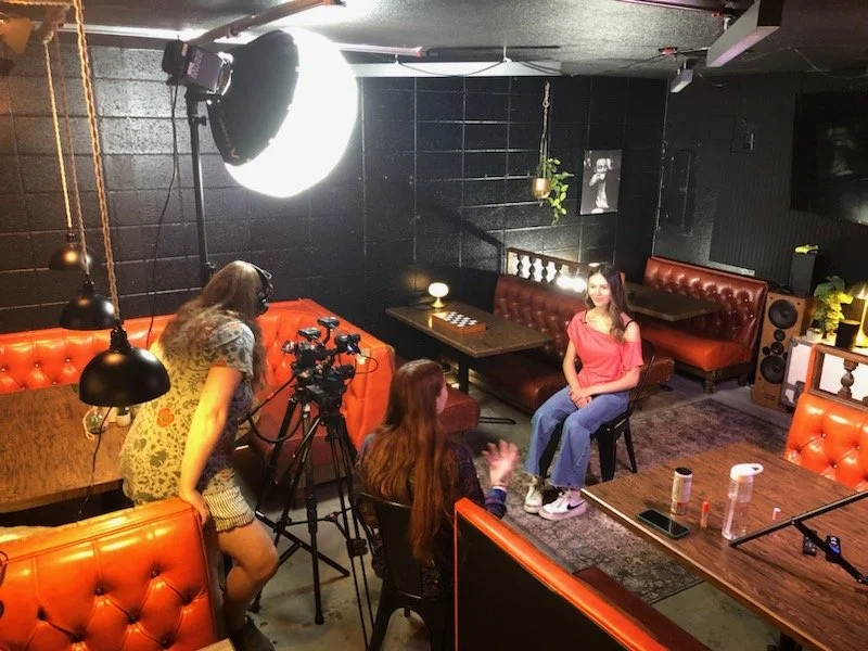 Behind the Scenes of the documentary Children of the Wolves, as Director Barb Lang and videographer Mary Kienzle interview Sasha.  Location: Lovekin in Garden City, Idaho.