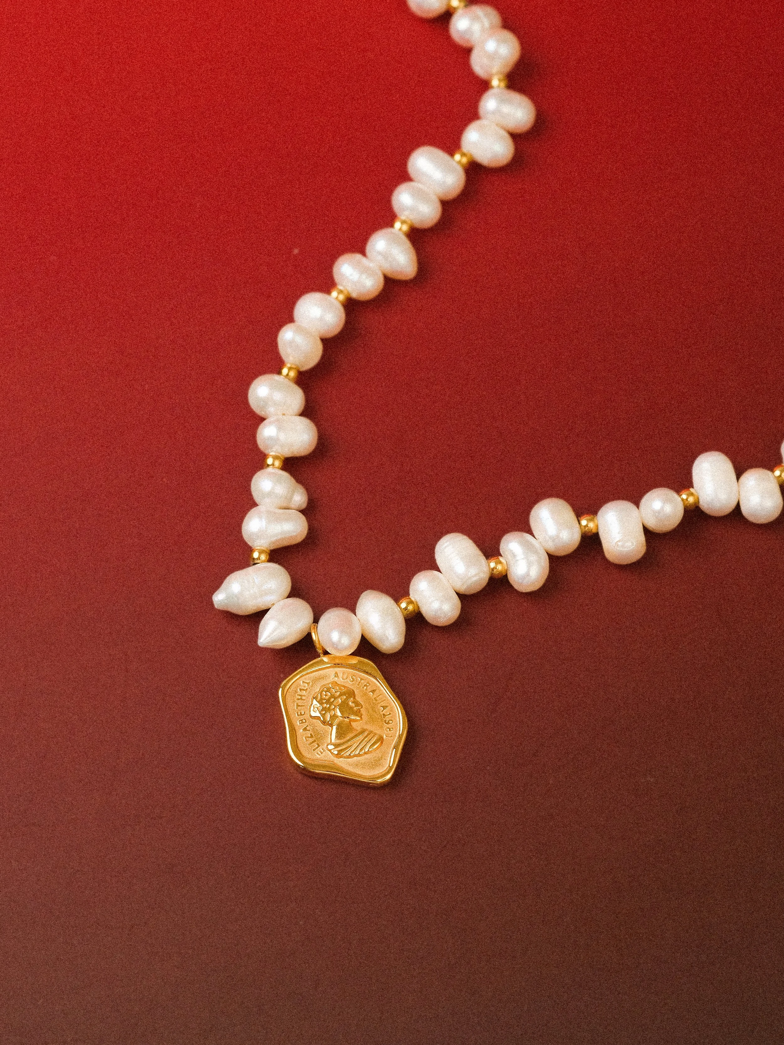 Flanerie Wholesale Jewelry carries 18K Gold PVD Plated Non-tarnish waterproof coin necklace with freshwater pearl.