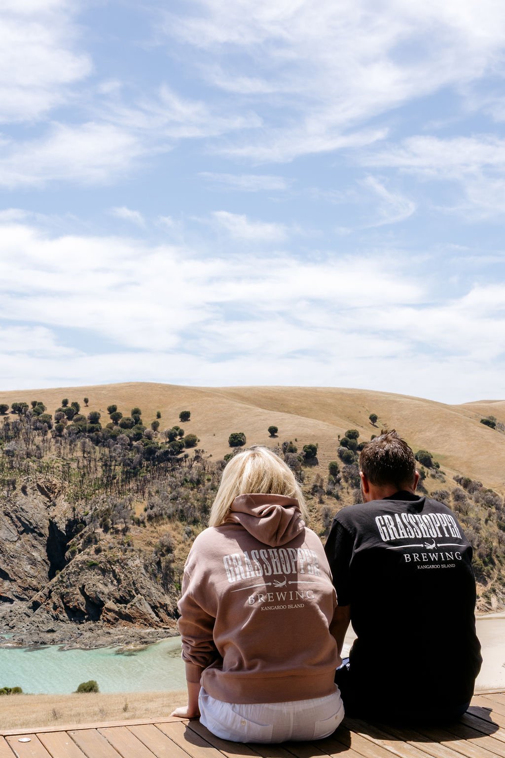 Guests wearing Grasshopper Brewery Merchandise