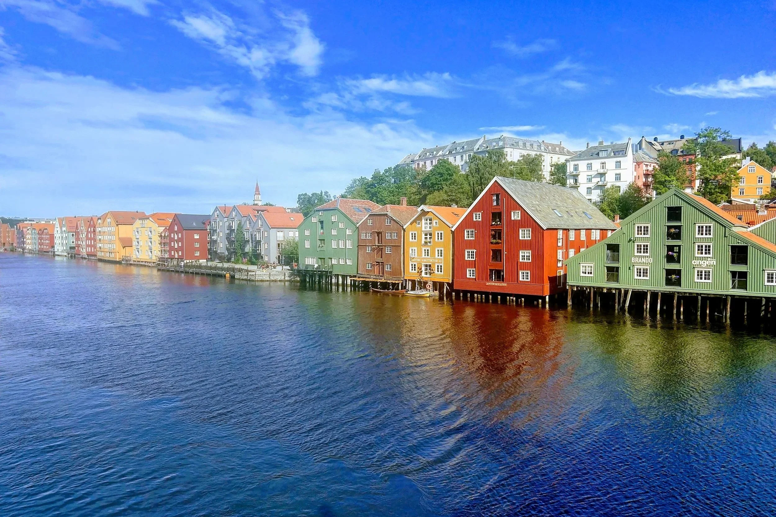 Colourful houses along the river in Trondheim, where Sorcha first lived in Norway