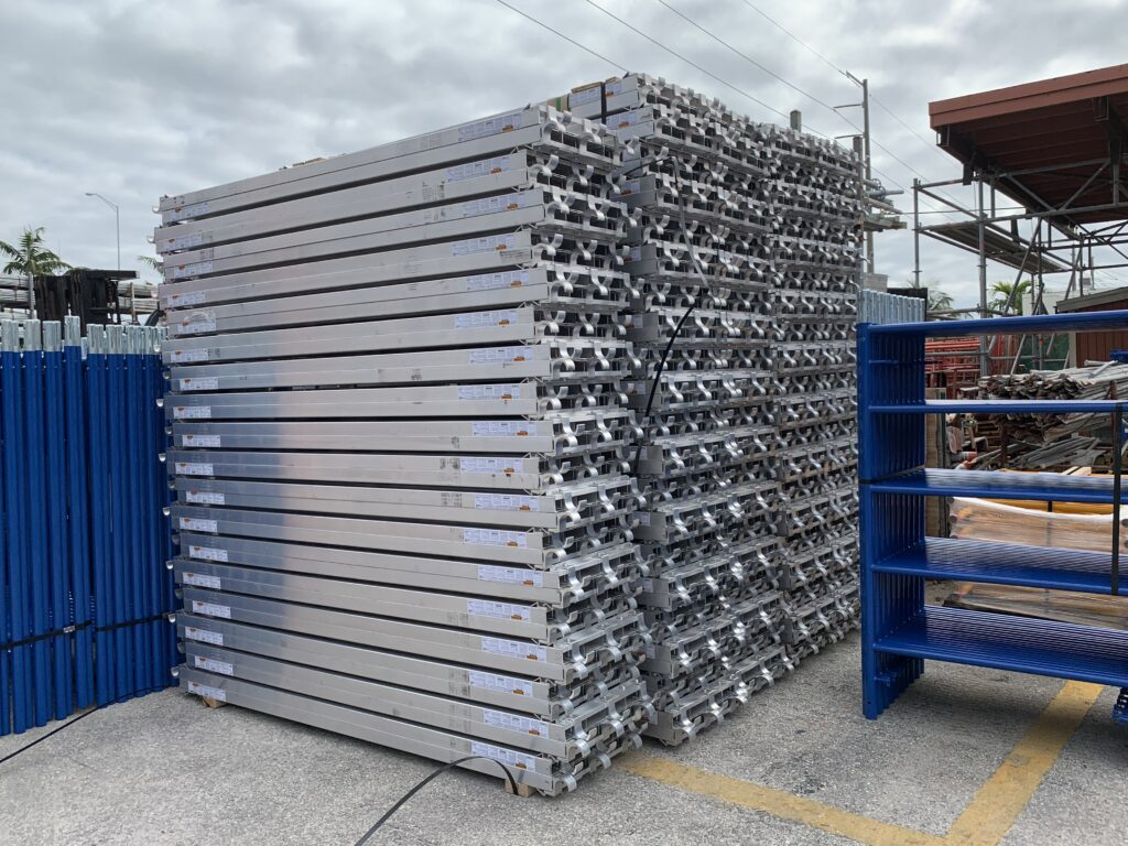 Aluminum scaffold decks with attachment hooks for masonry frames, available at Haynes Scaffolding in Palm Beach County, FL.