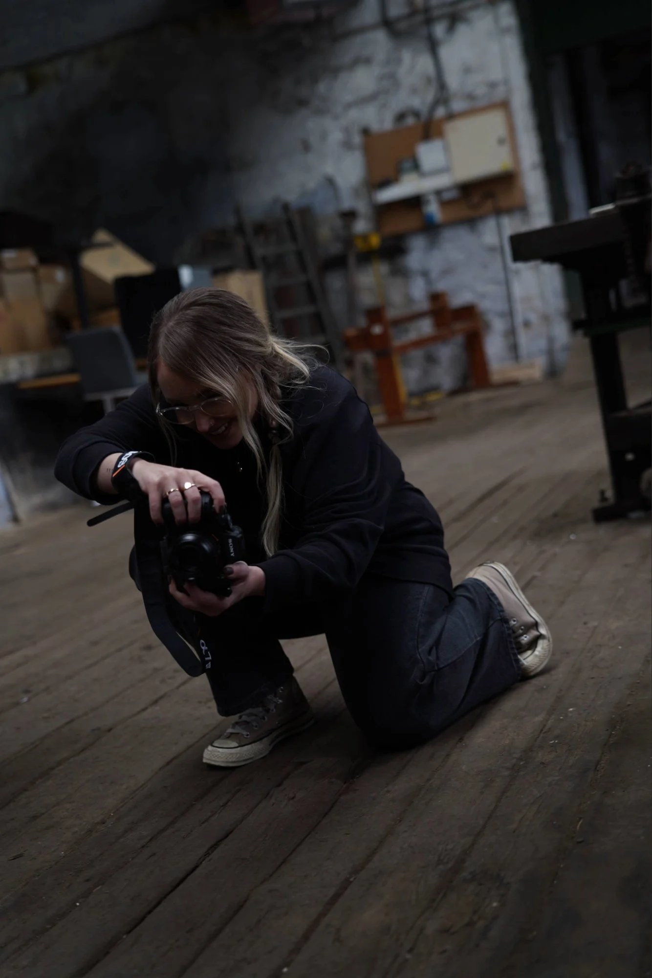 Bex from Rebel Black Studio photographing content during a brand shoot.