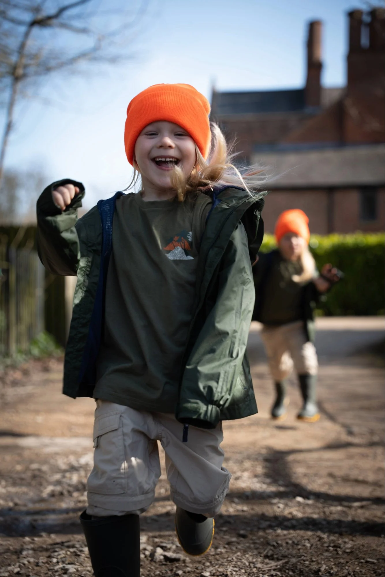 Child wearing Mountain Warehouse clothing during an outdoor campaign content shoot.