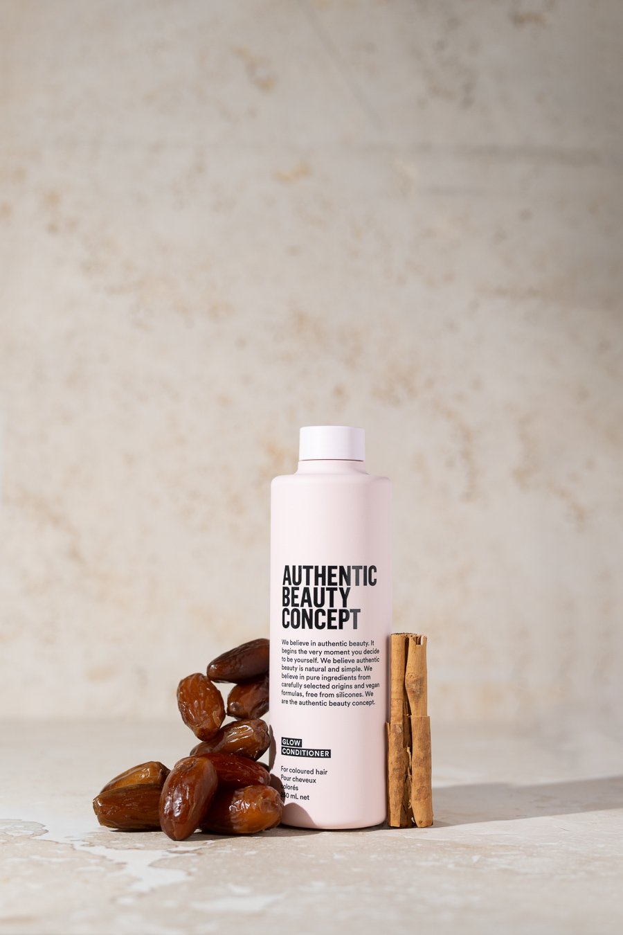 Product photography of Authentic Beauty Concept haircare with natural styling elements for ecommerce and marketing.