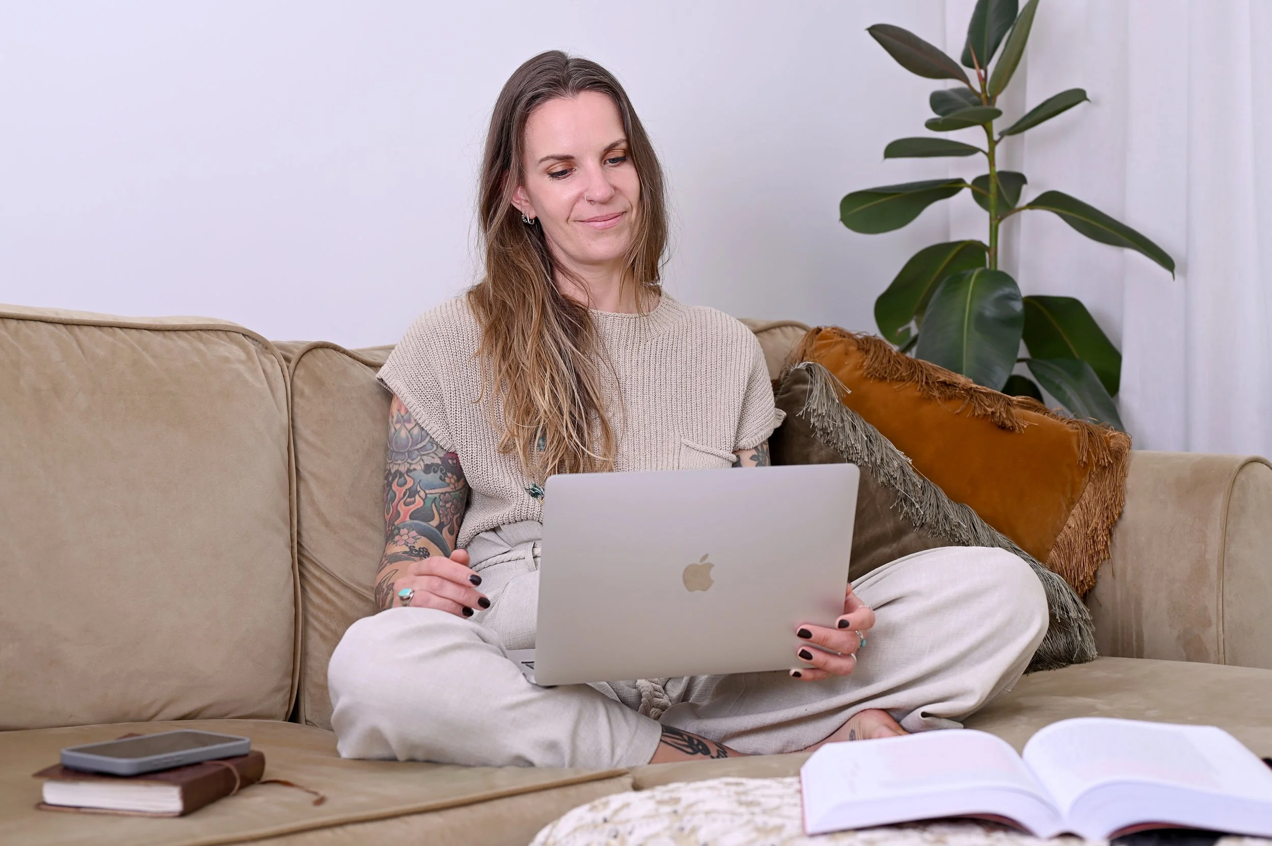 Founder working online with clients, photographed during a Cheshire brand photography session.