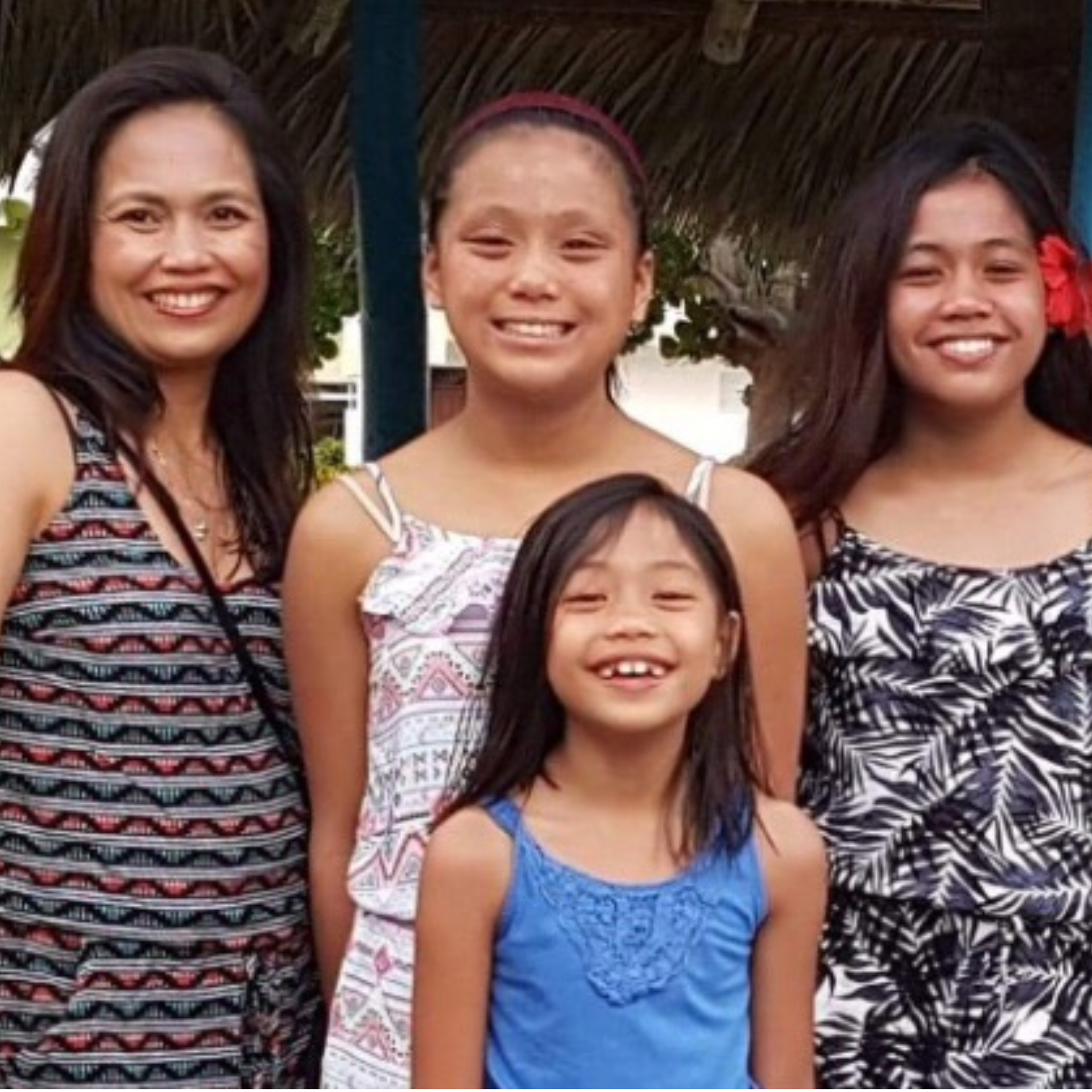 Rhoderie Estrada was a devoted mother to her three daughters.png