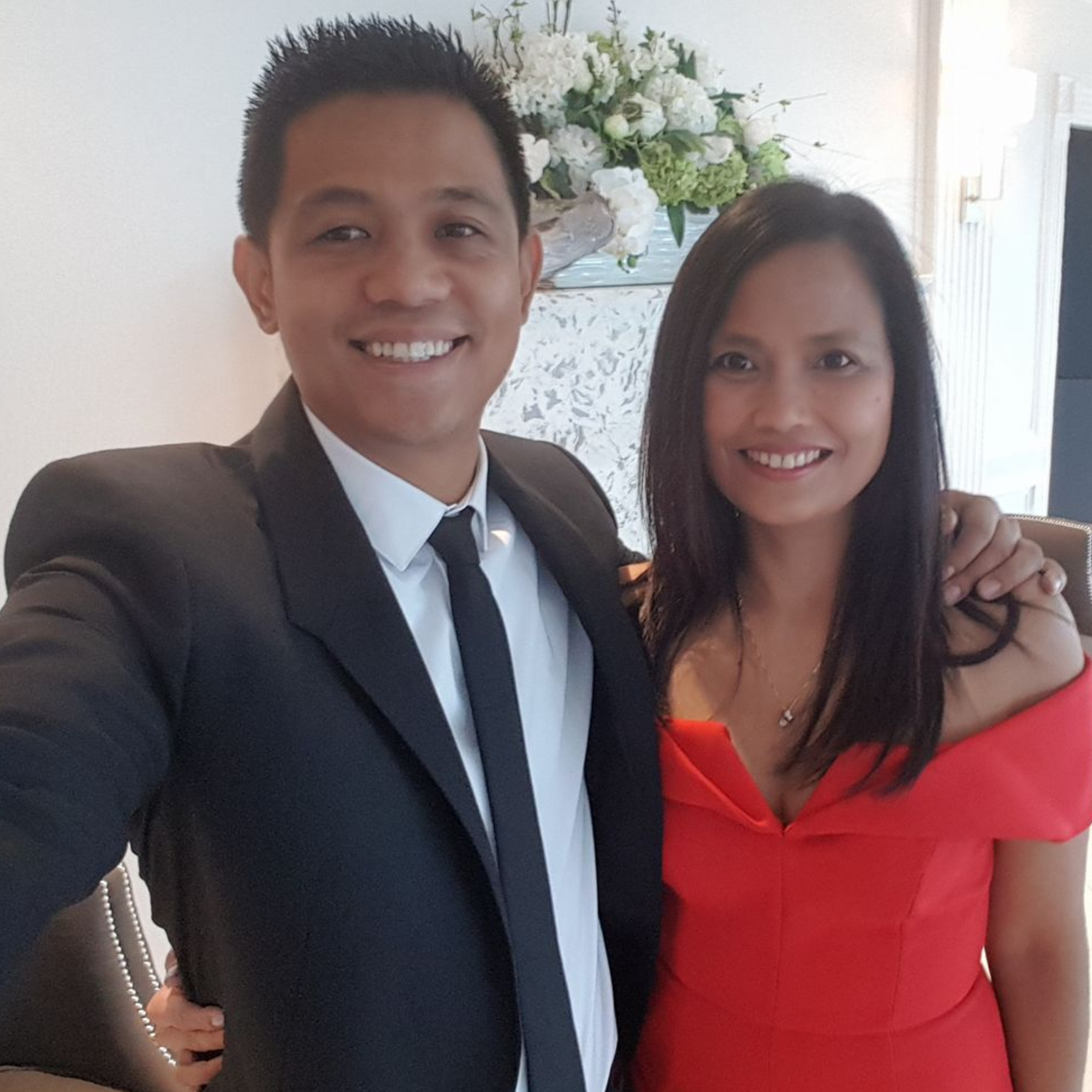 Gerald Aquintey with his beloved wife Rhoderie Estrada.png