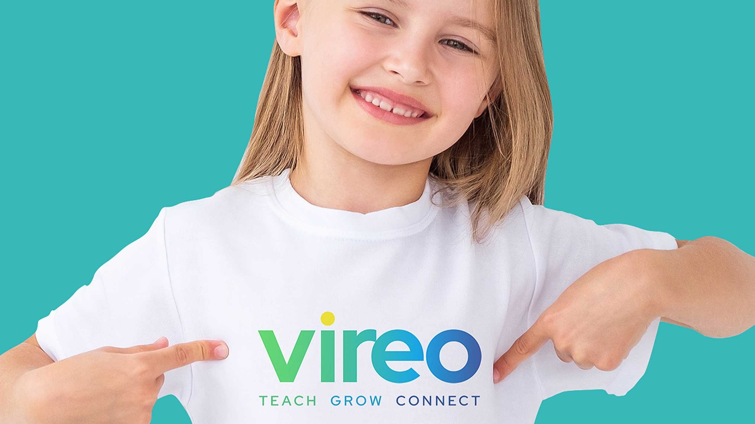 Photo of a happy child wearing a Vireo shirt