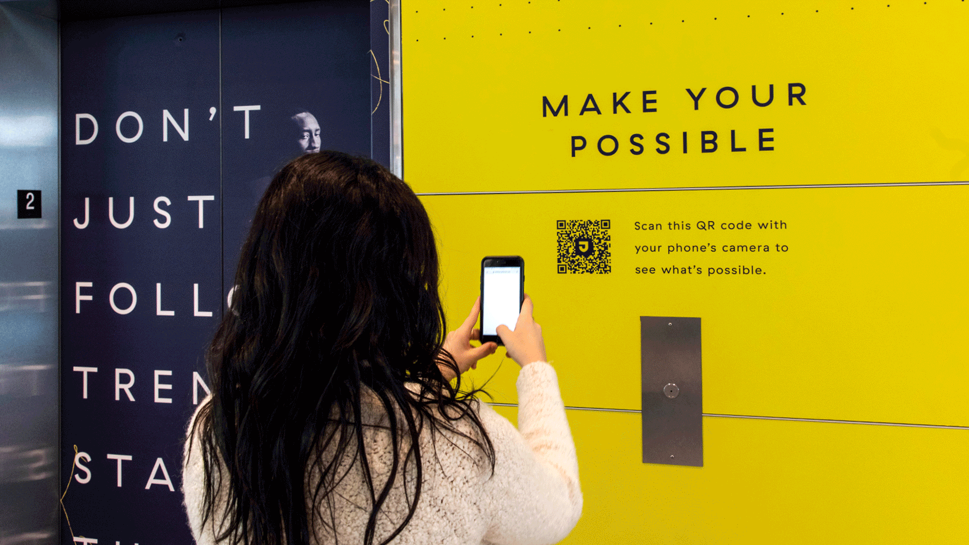 Dark blue background with a subtle gradient and small, faint markings or textures.