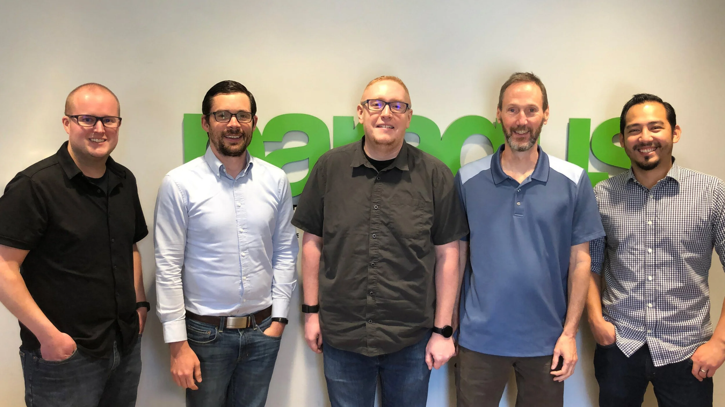 Smiling Employees, Press Release, Acquisition, Paragus IT Sign