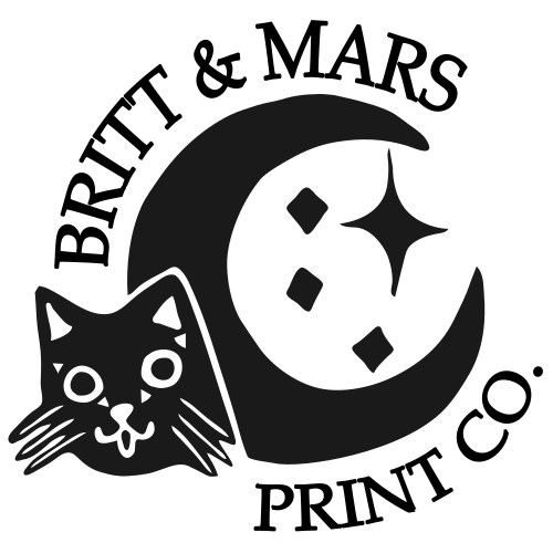 Britt & Mars Print Co Logo a present moon with sparkles and a cute kitty head