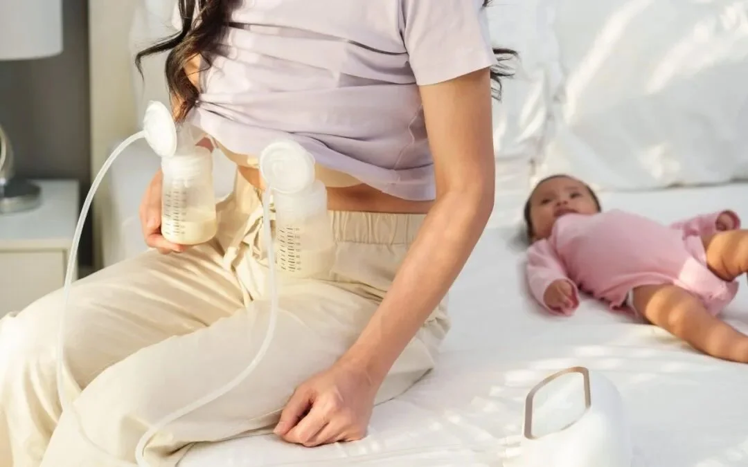 Parent using a breast pump while learning why pumping may not fully empty the breasts
