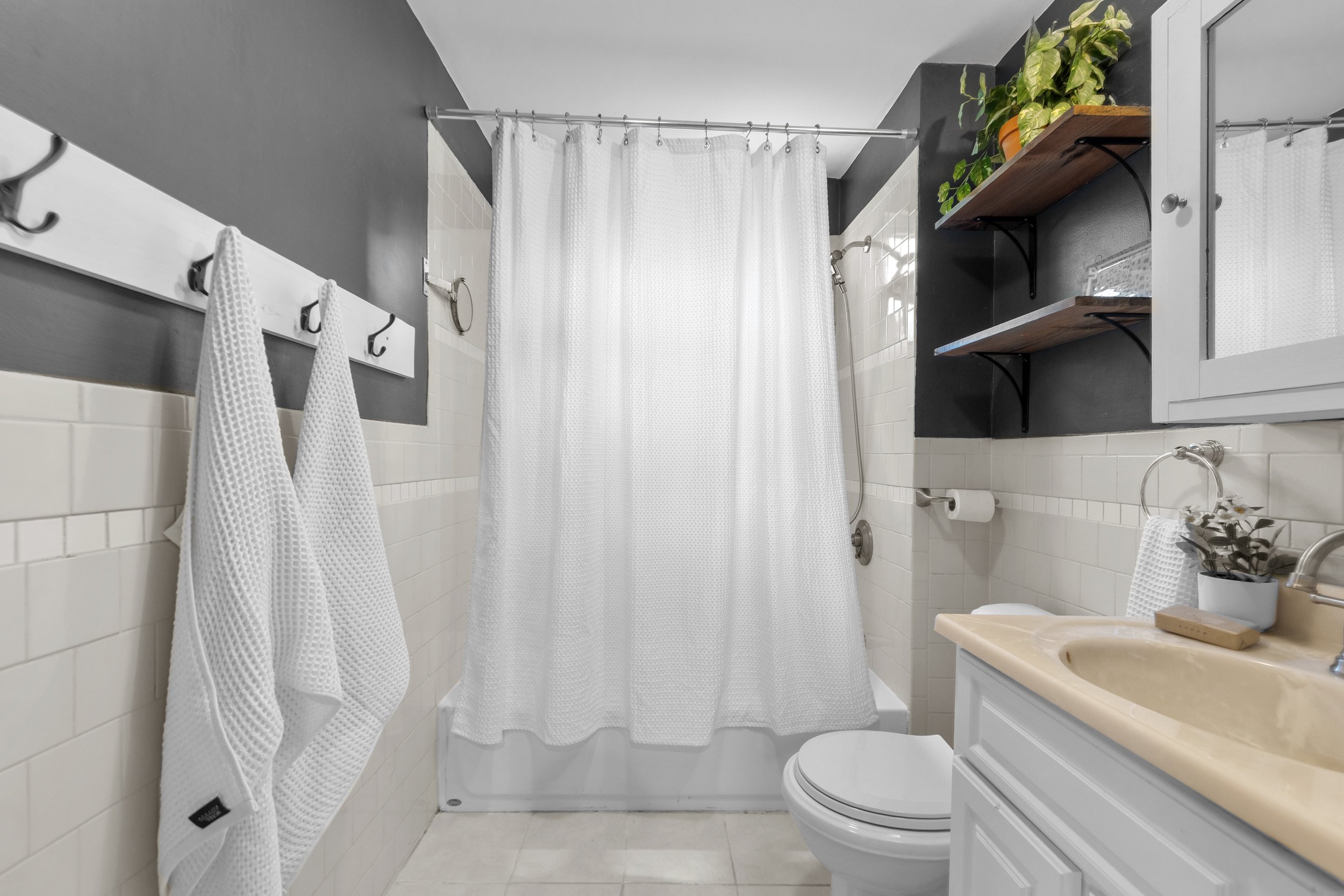 64 Hyde Park - full bath better.jpg