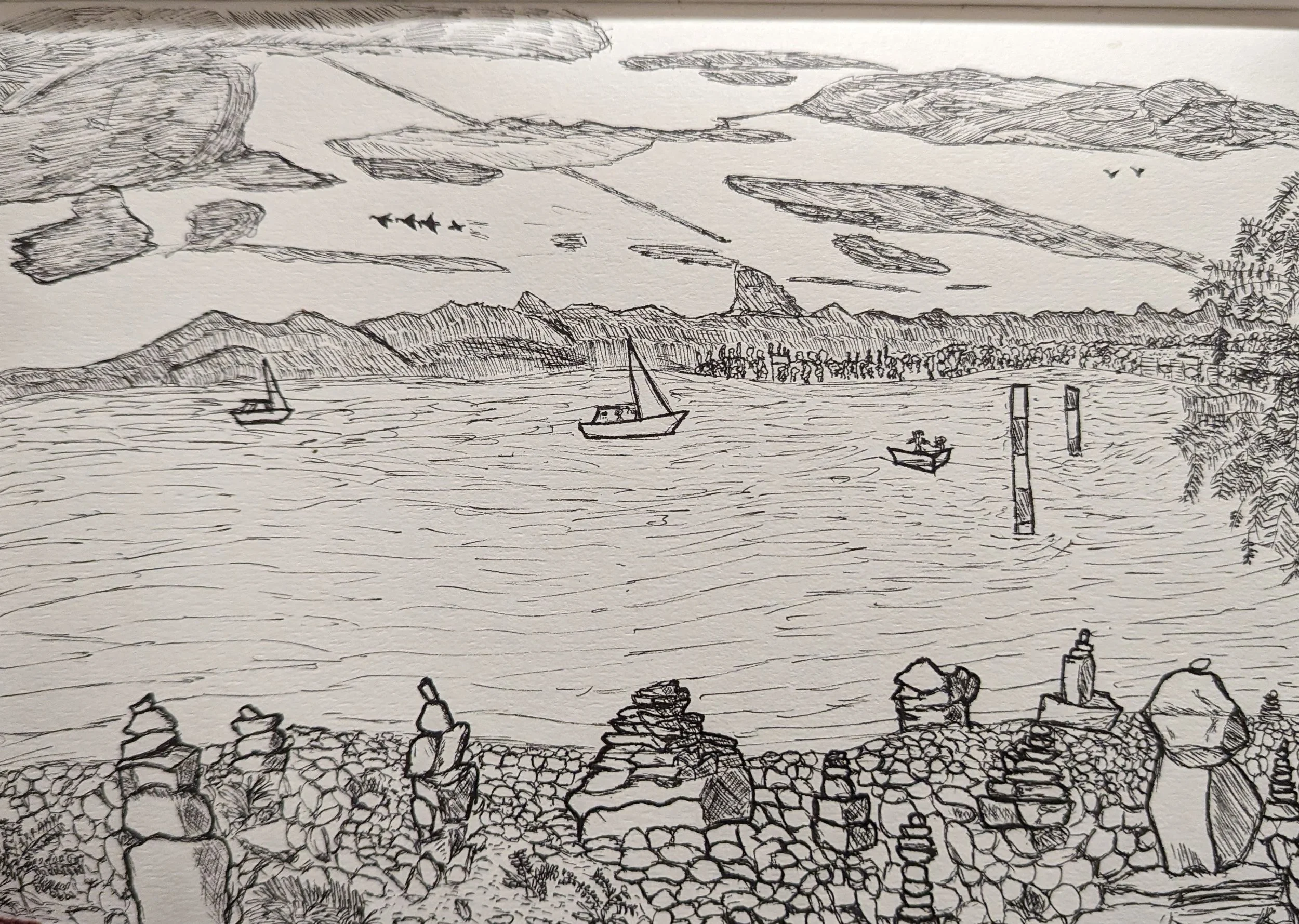 A black and white line drawing of a coastal scene with boats on the water, mountains in the background, and a stone wall with stacked rocks and plants in the foreground.