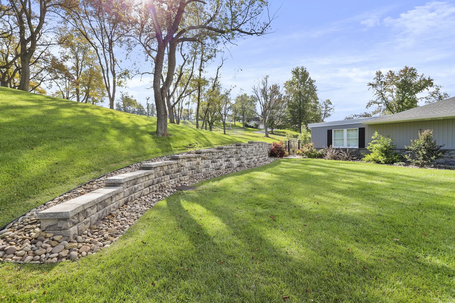 retaining wall in Monroe Township with integrated garden beds