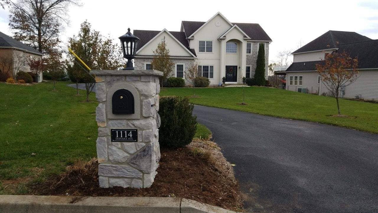 Large stone mailbox in Camp Hill, PA at neighborhood entrance