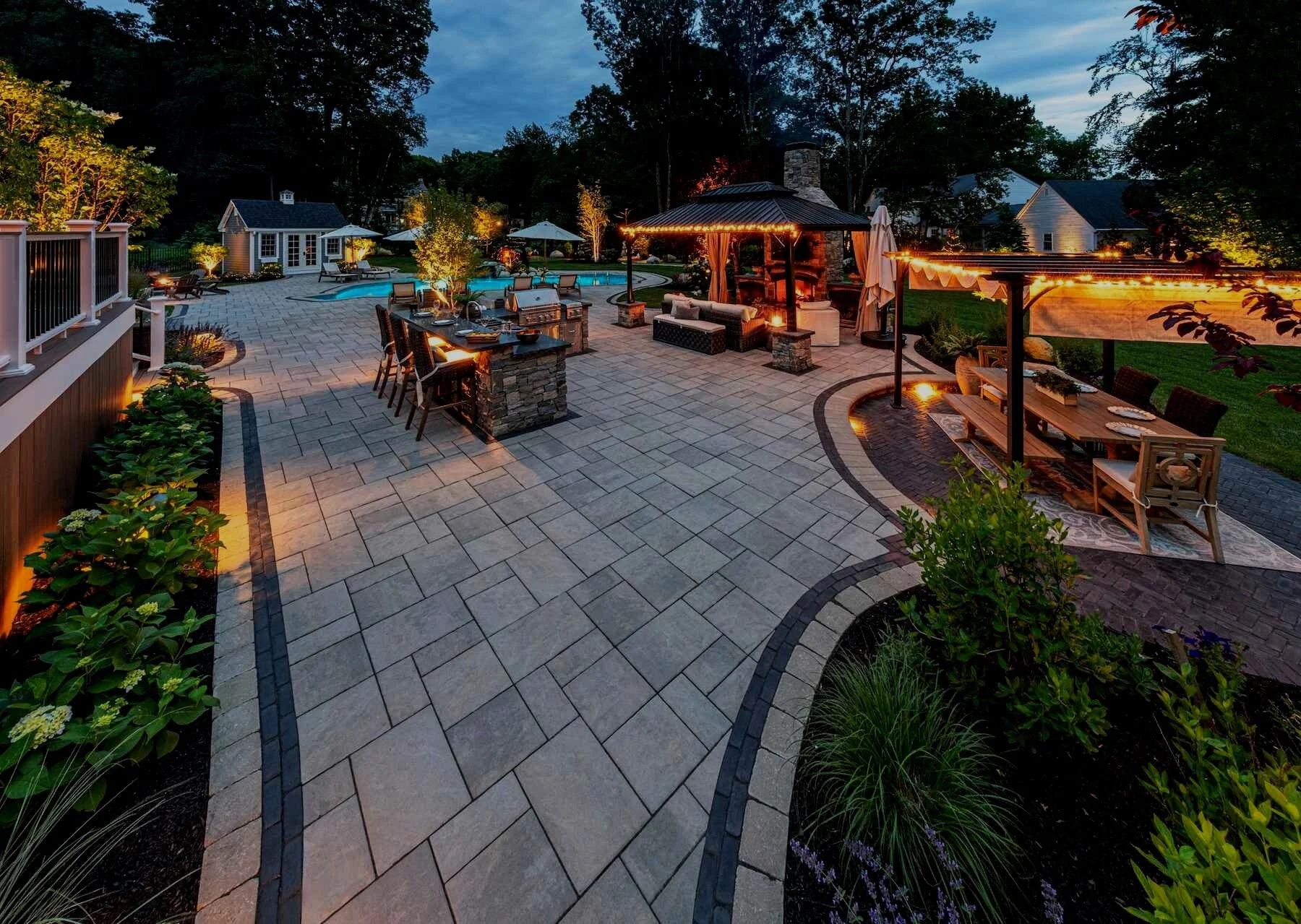 Susquehanna Township paver patio with built-in bench and fire bowl