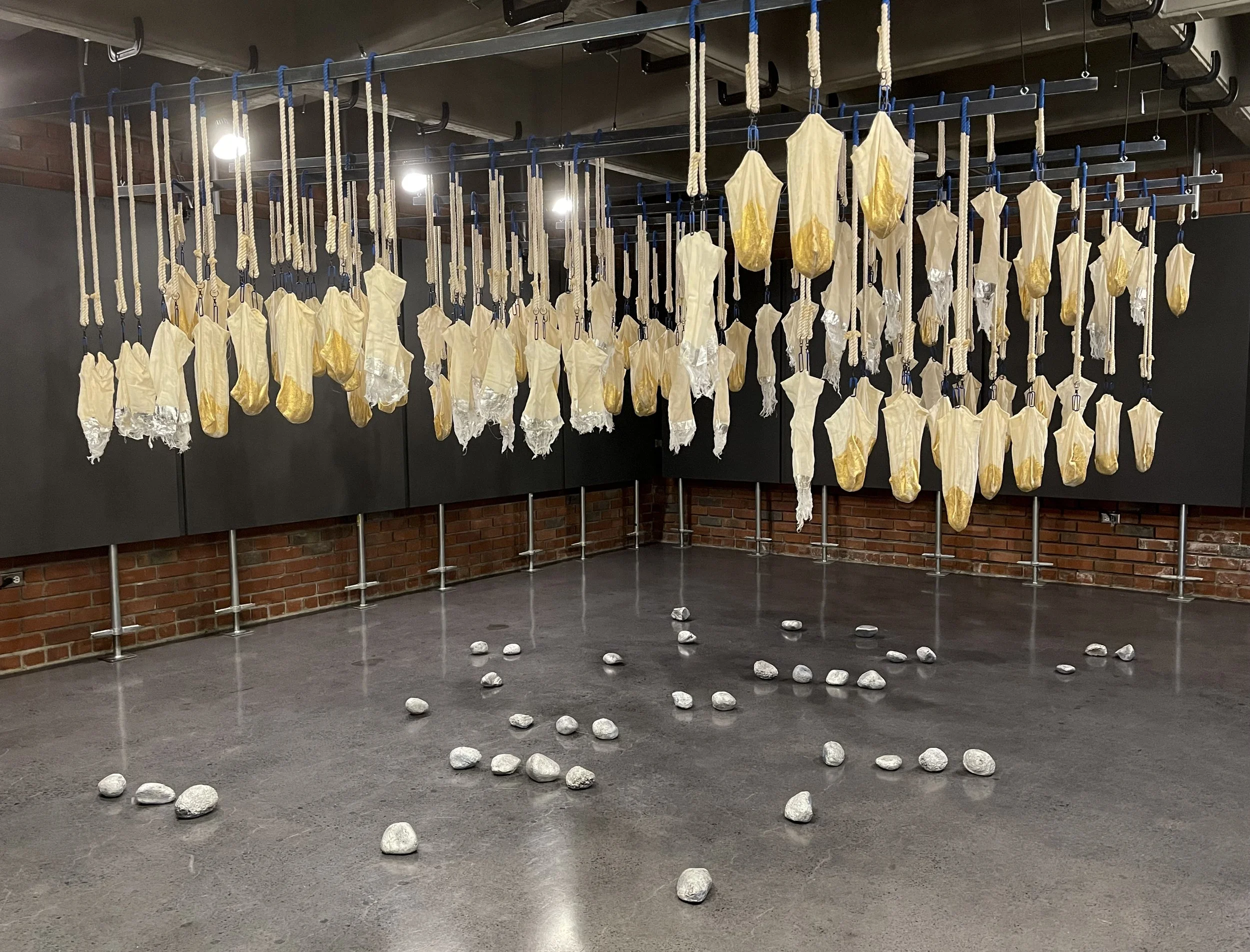 SawyerRose_Dawline_2019_Linen_Cotton_Rope_GoldandSilverLeaf_MetalClaspsRings_Wood_Stones_Acrylic_Enamel_72x60x180inches_installedNUMU.jpg
