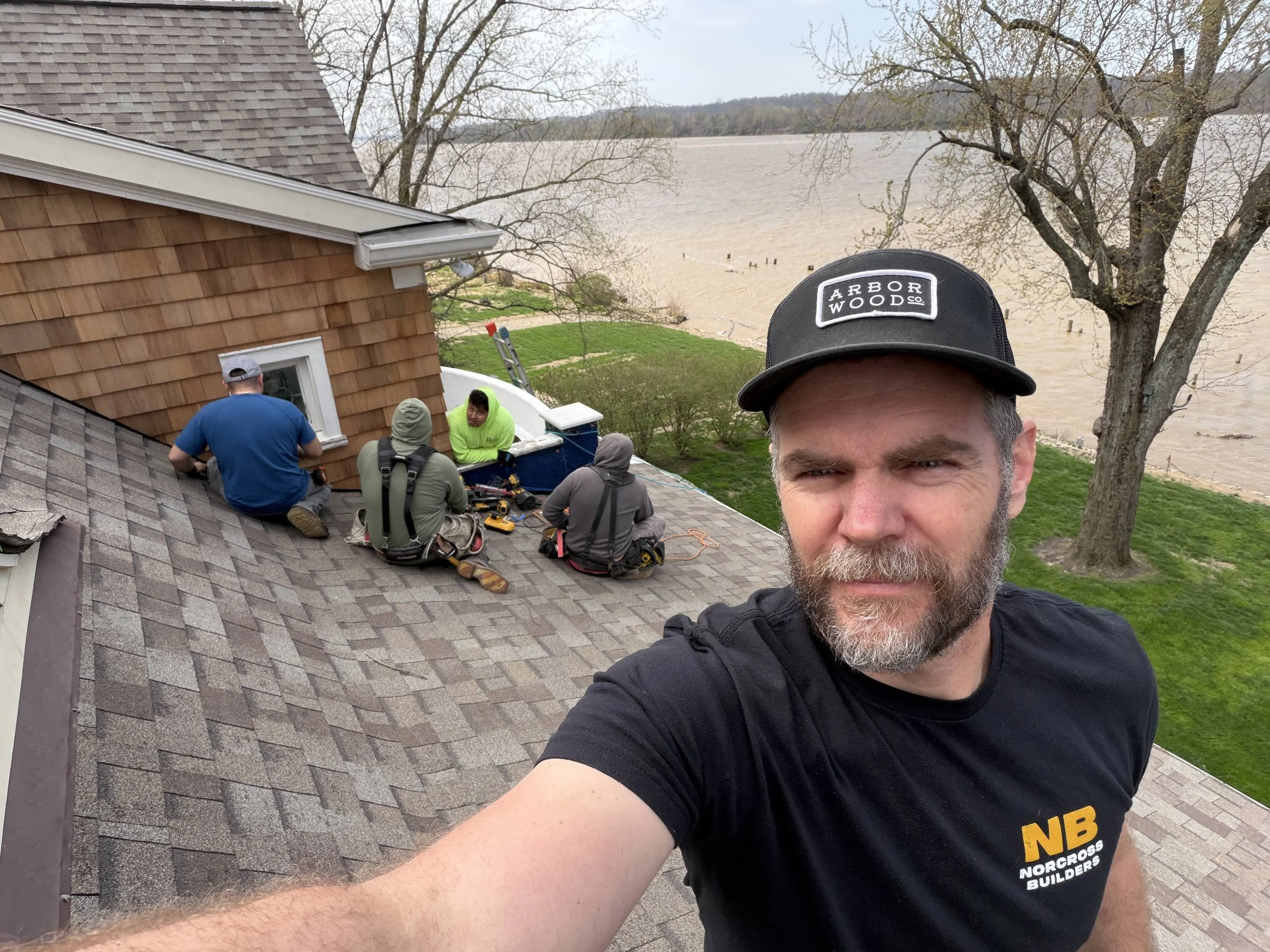 photo of Gabe Norcross, general contractor in Louisville KY with a roofing crew