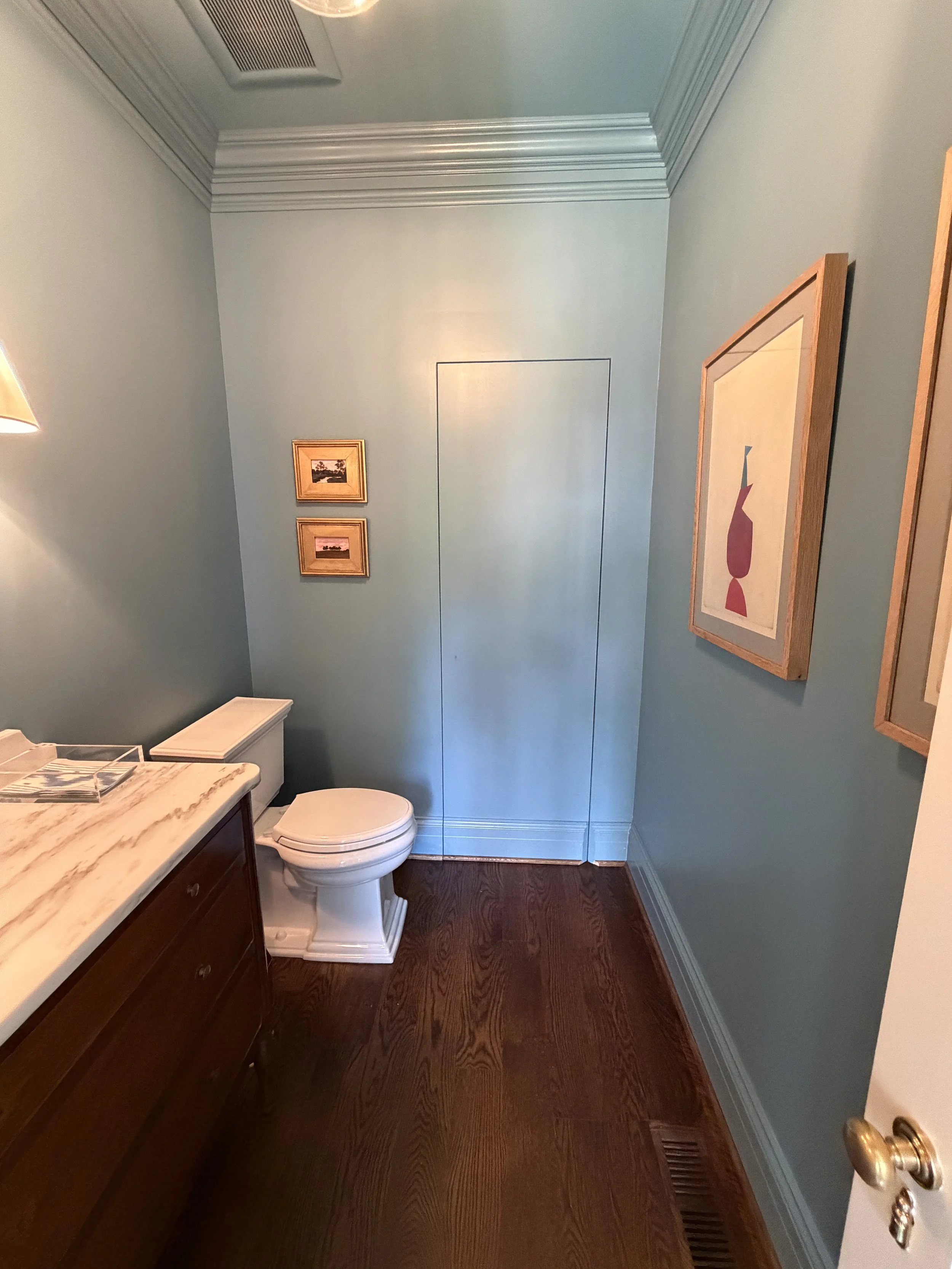 newly remodeled powder room, color drenched in Farrow and Ball Stone Blue and A Jib Door
