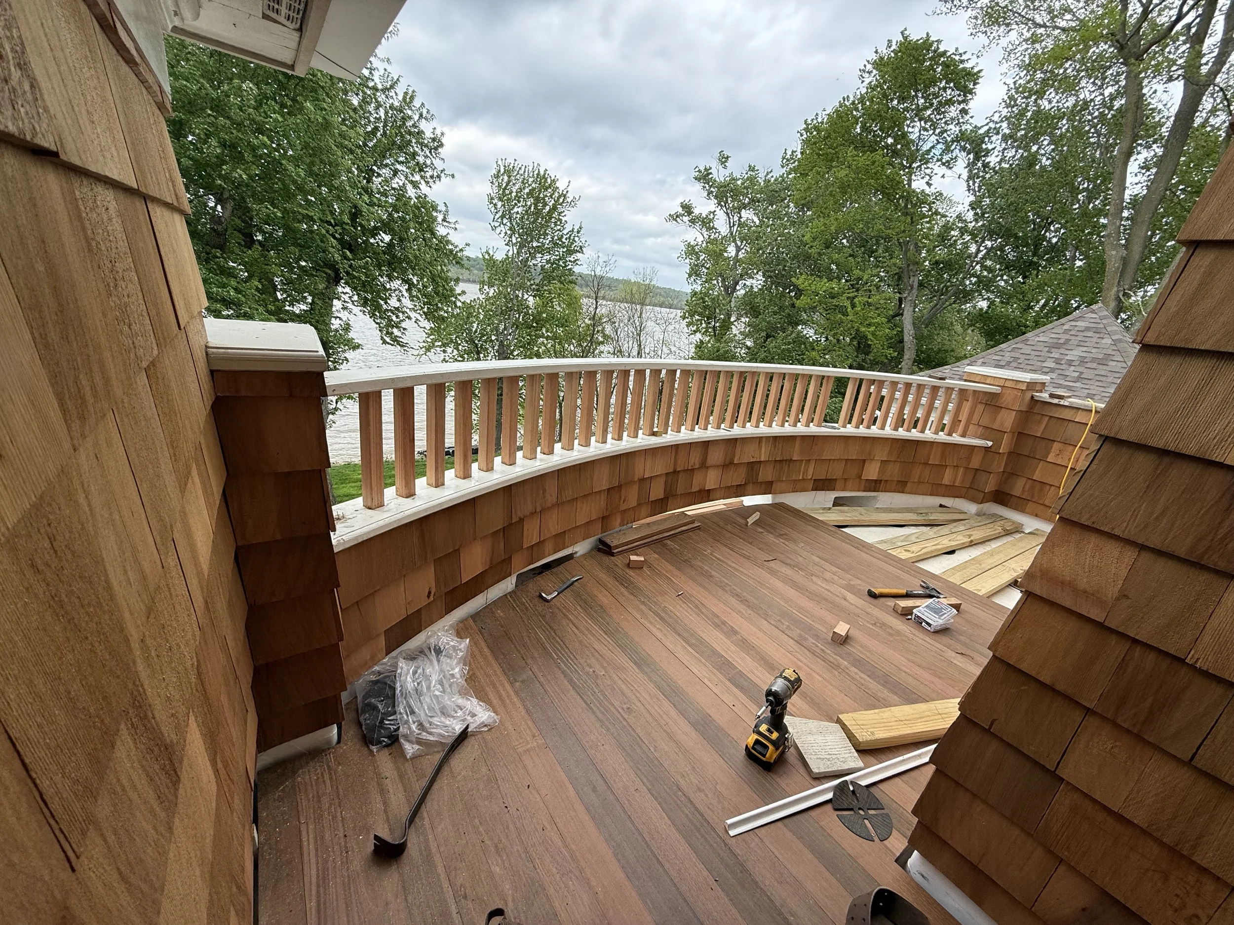 Nprcross Builders is crafting a curved ipe deck in Prospect KY