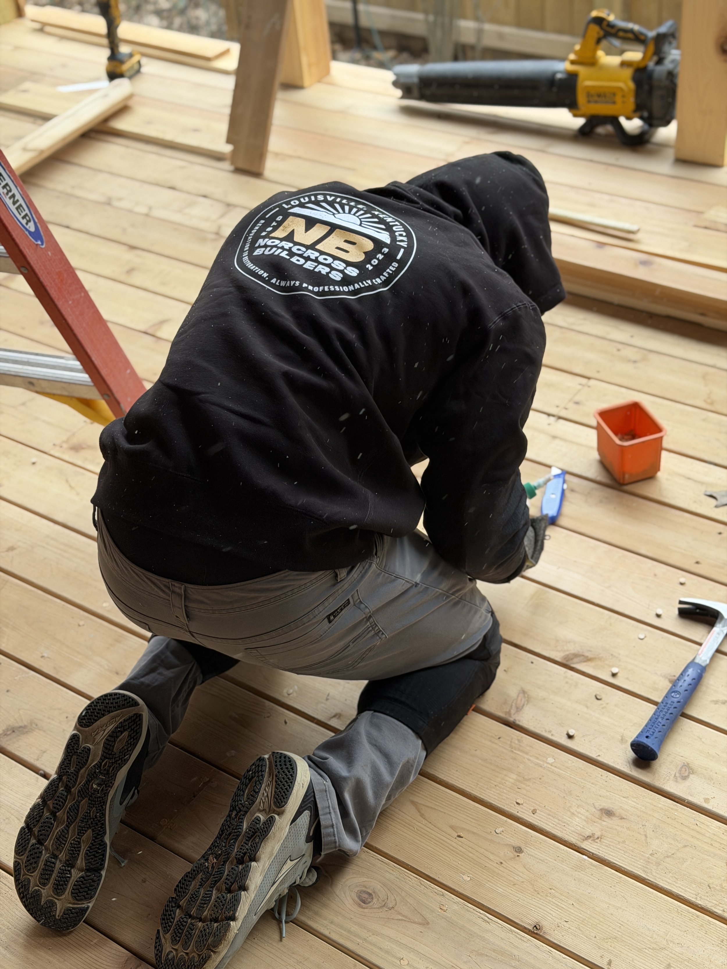 Gabe Norcross of Norcross Builders a general contractor in Louisville is building a custom deck