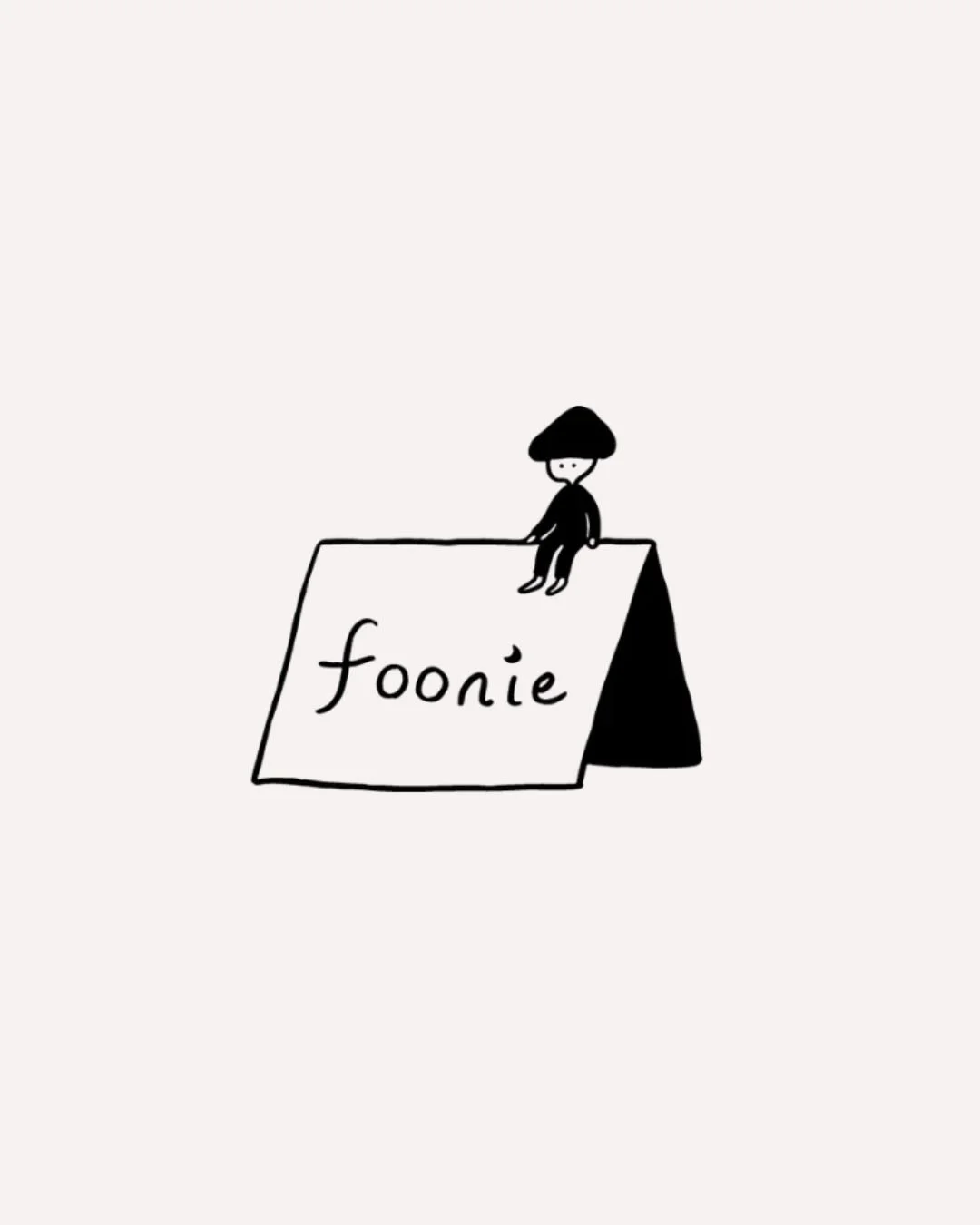 A simple black and white illustration of a small figure with short hair sitting on a tilted sign that reads "foonie" in lowercase letters.